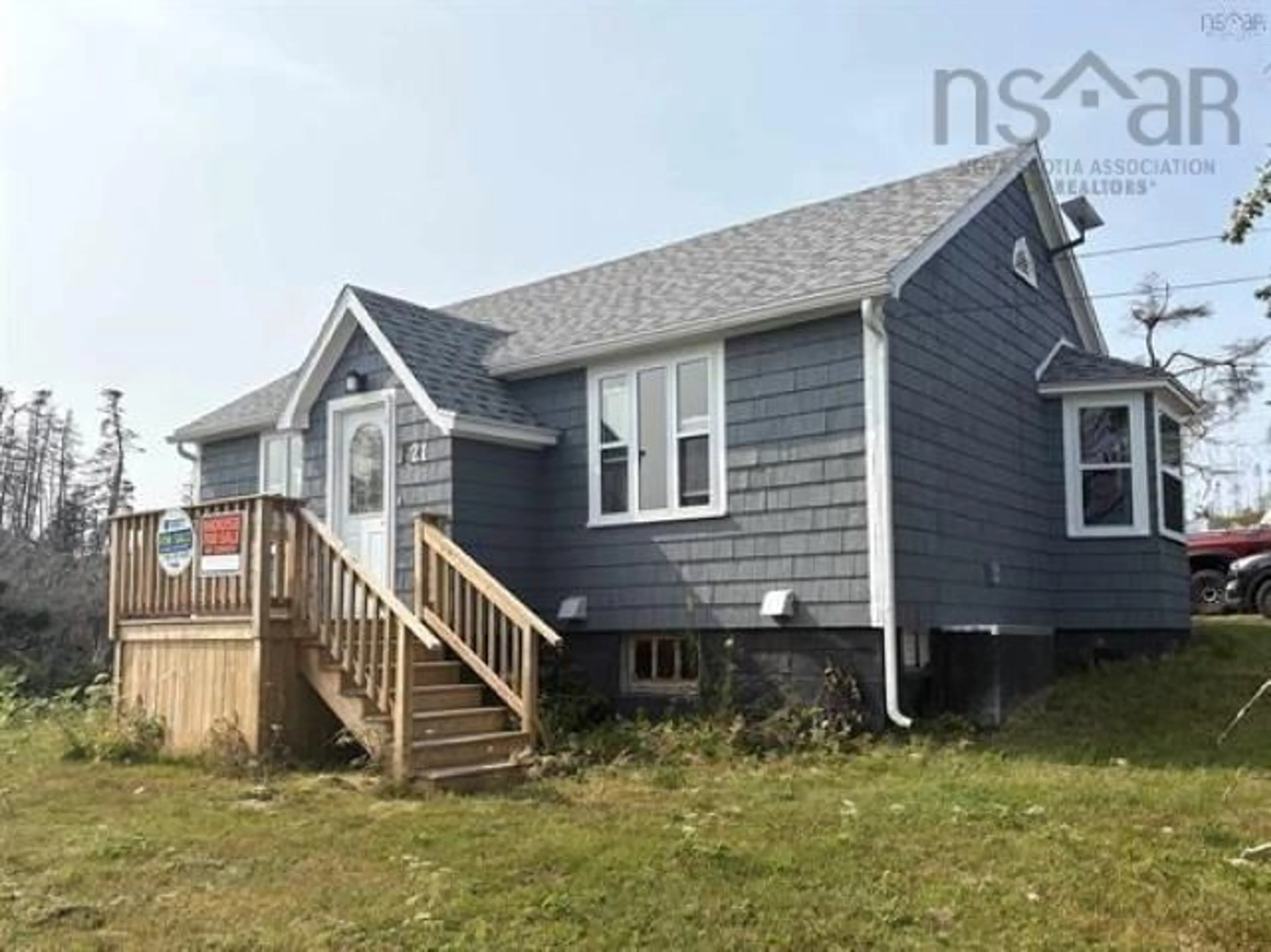 Home with vinyl exterior material, building for 21 Marconi St, Louisbourg Nova Scotia B1C 1K2