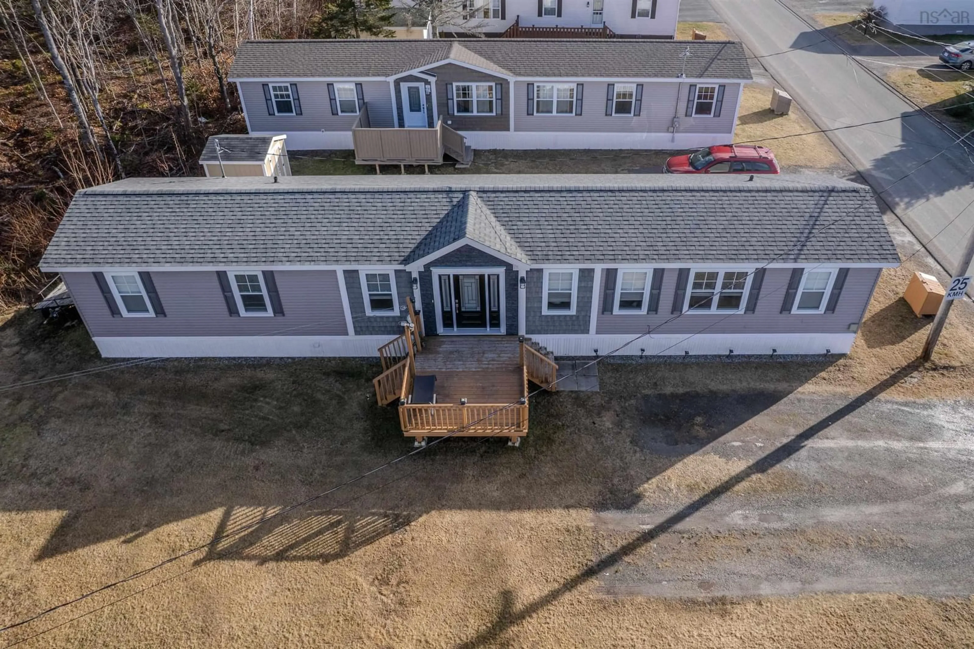 A pic from outside/outdoor area/front of a property/back of a property/a pic from drone, building for 6 Third St, Howie Centre Nova Scotia B1L 1C9