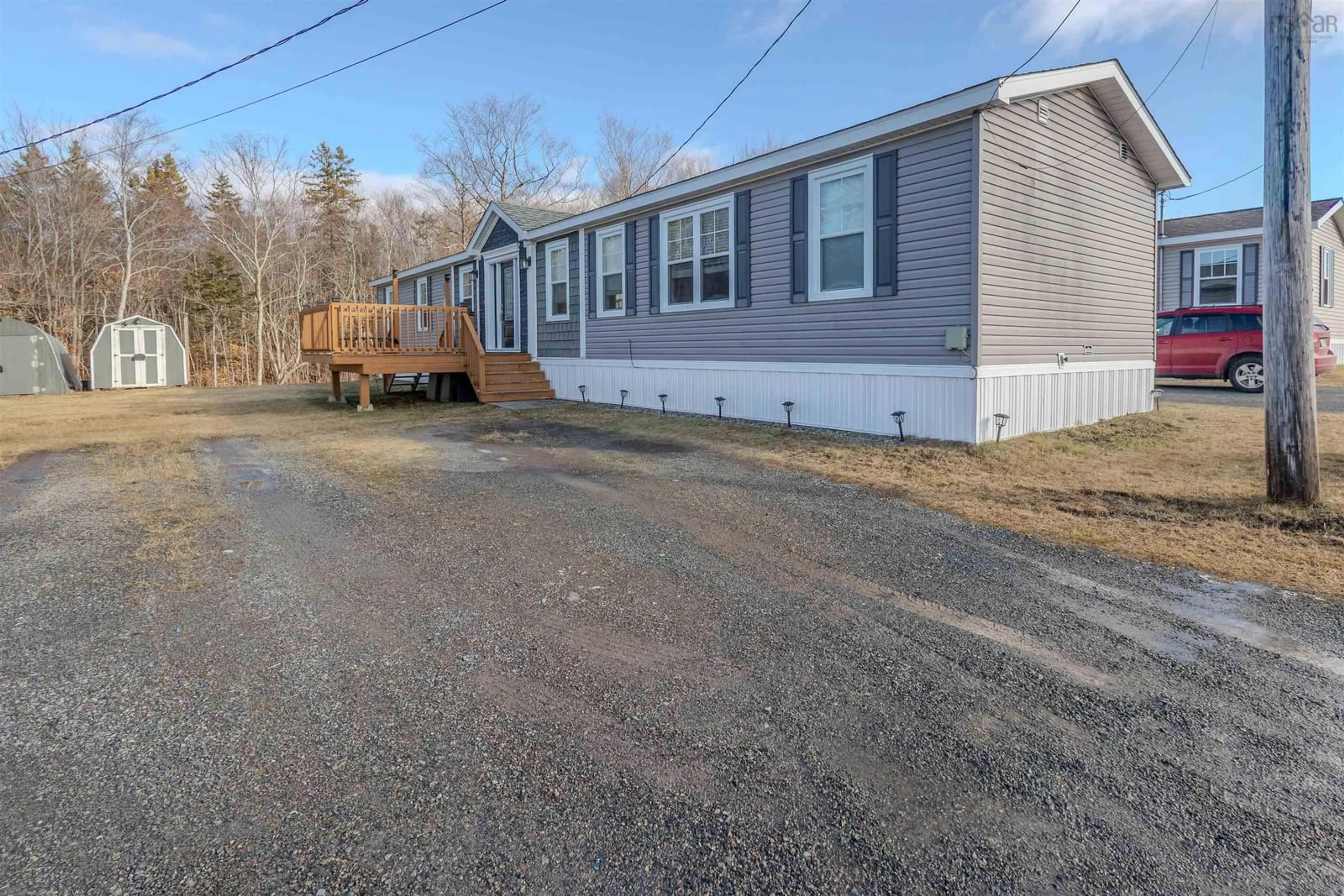 Home with vinyl exterior material, street for 6 Third St, Howie Centre Nova Scotia B1L 1C9