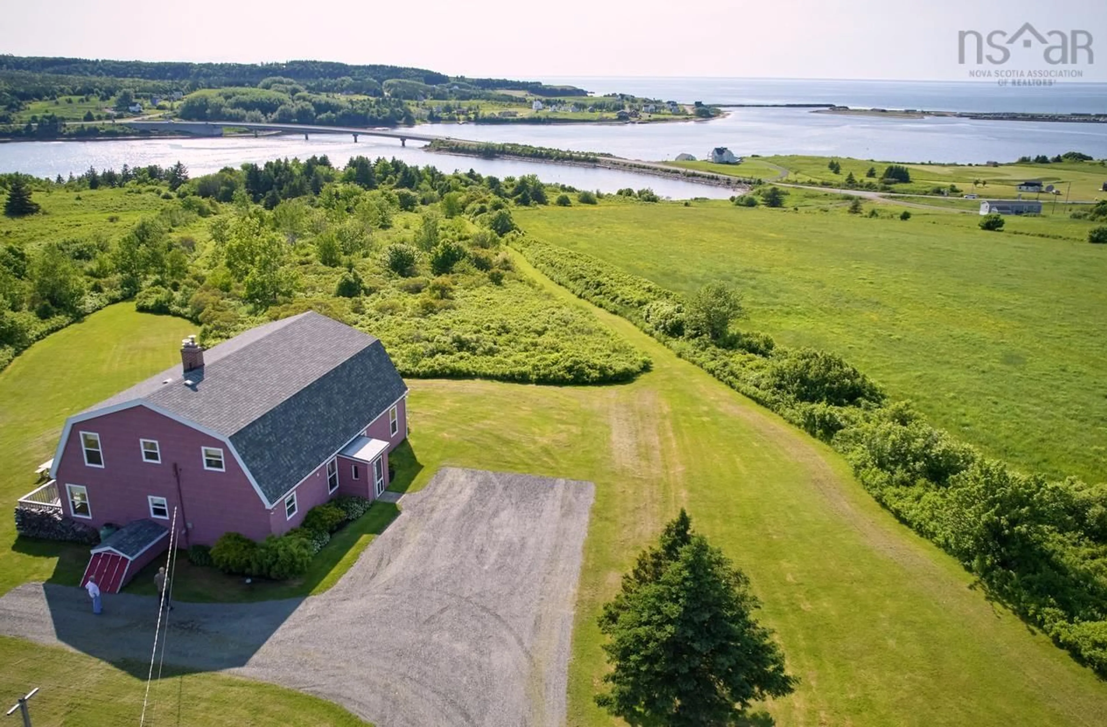 A pic from outside/outdoor area/front of a property/back of a property/a pic from drone, water/lake/river/ocean view for 70 South Cormier Rd, Belle Côte Nova Scotia B0E 1C0