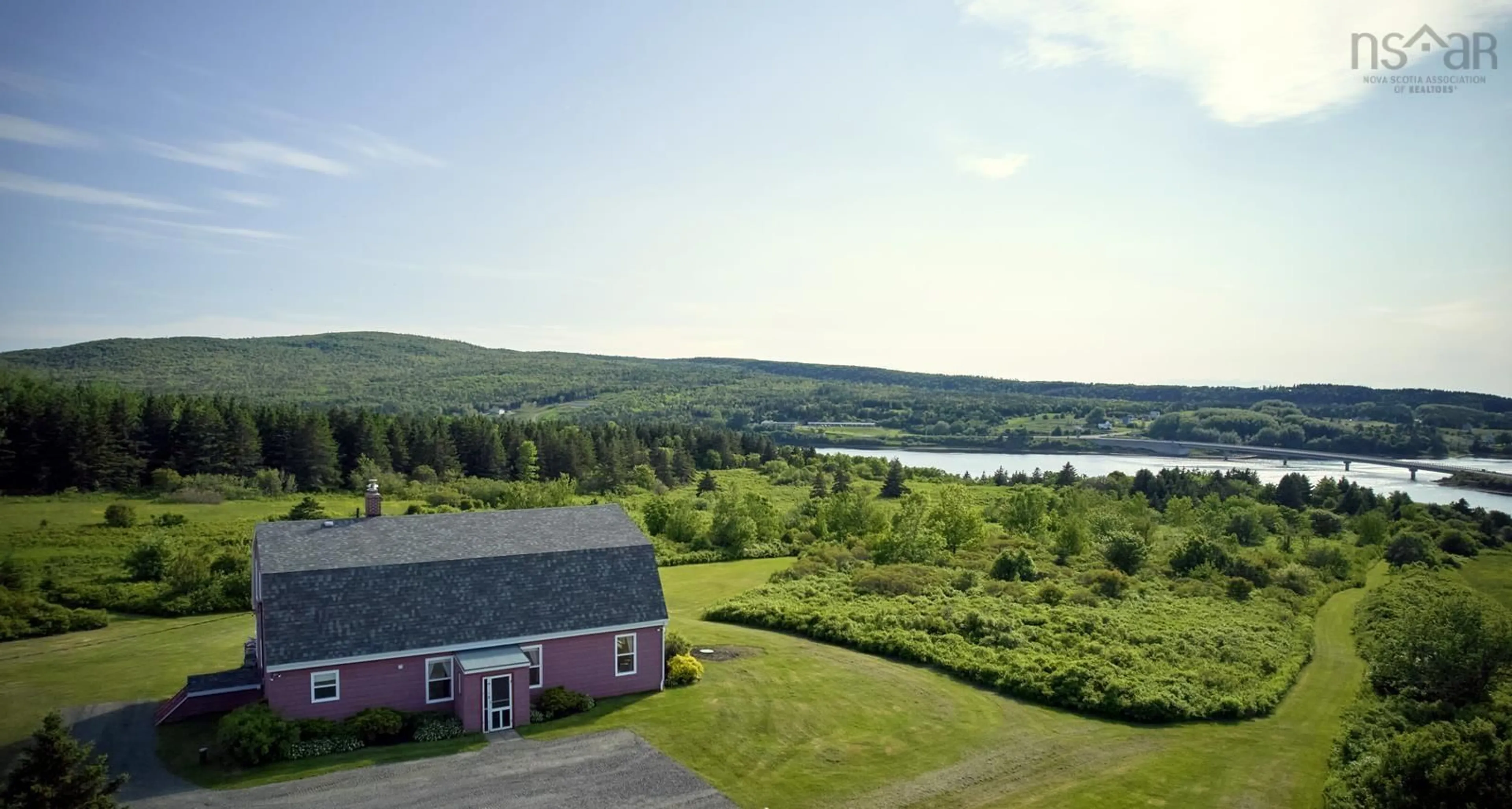 A pic from outside/outdoor area/front of a property/back of a property/a pic from drone, water/lake/river/ocean view for 70 South Cormier Rd, Belle Côte Nova Scotia B0E 1C0