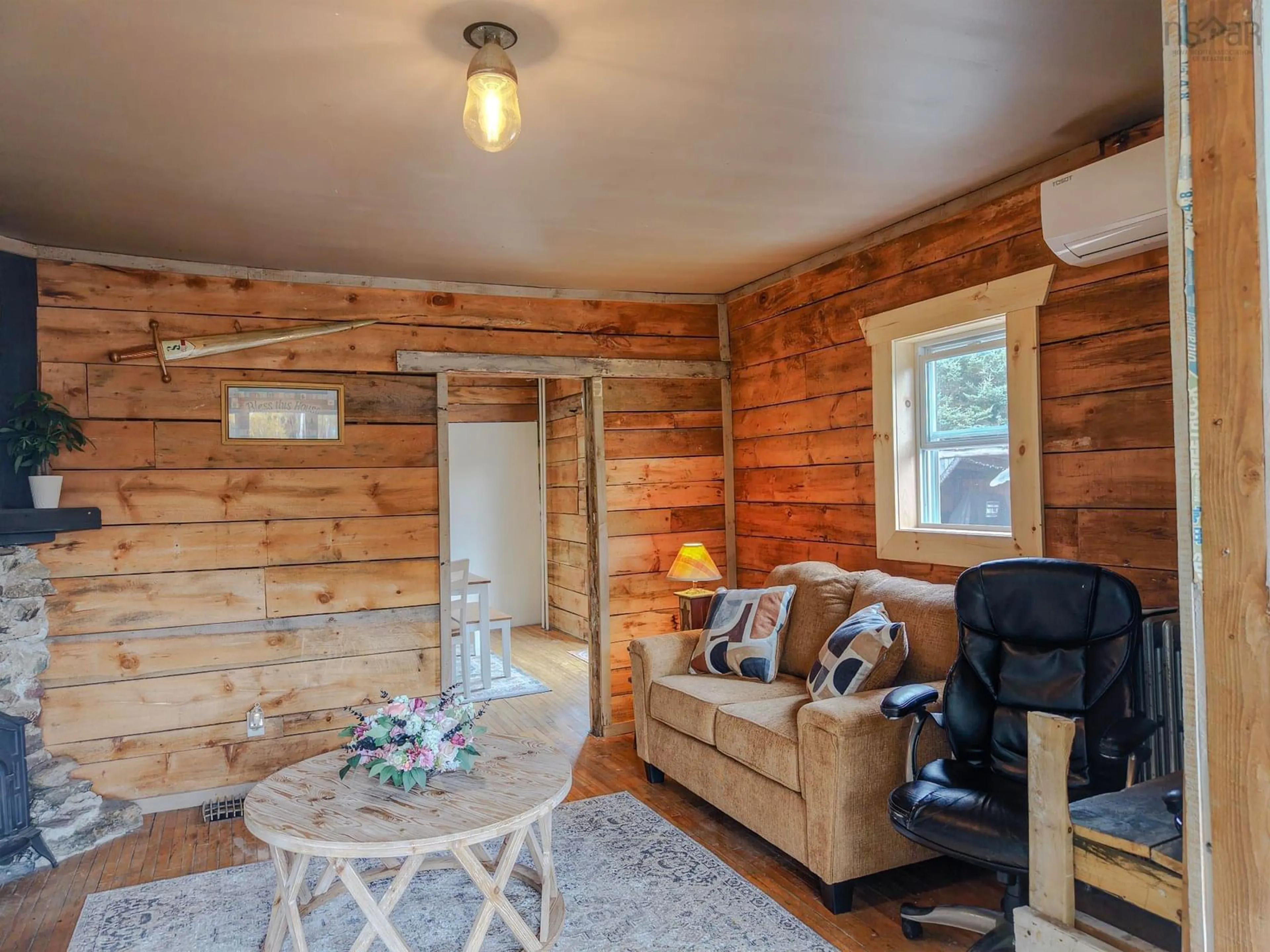 Living room with furniture, wood/laminate floor for 1651 Trout Brook Rd, Albert Bridge Nova Scotia B1K 2L2