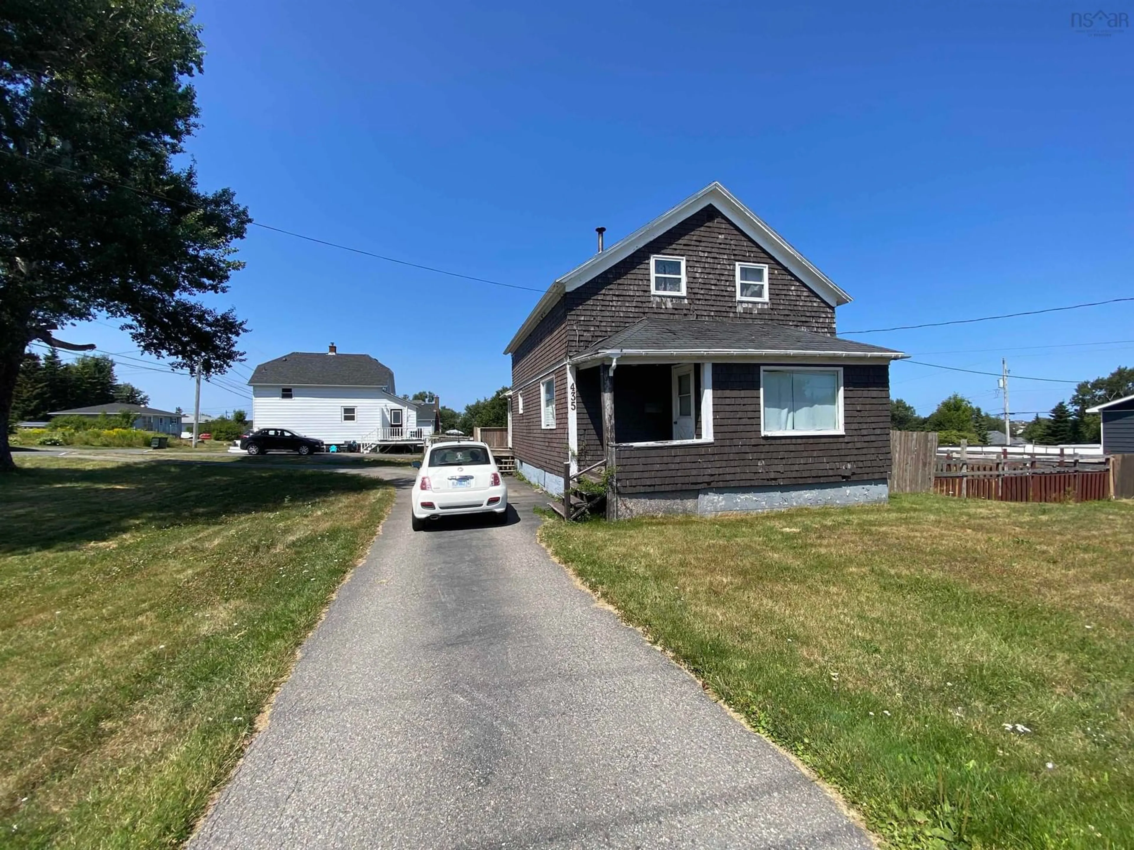 A pic from outside/outdoor area/front of a property/back of a property/a pic from drone, street for 435 Mahon St, New Waterford Nova Scotia B1H 2A5