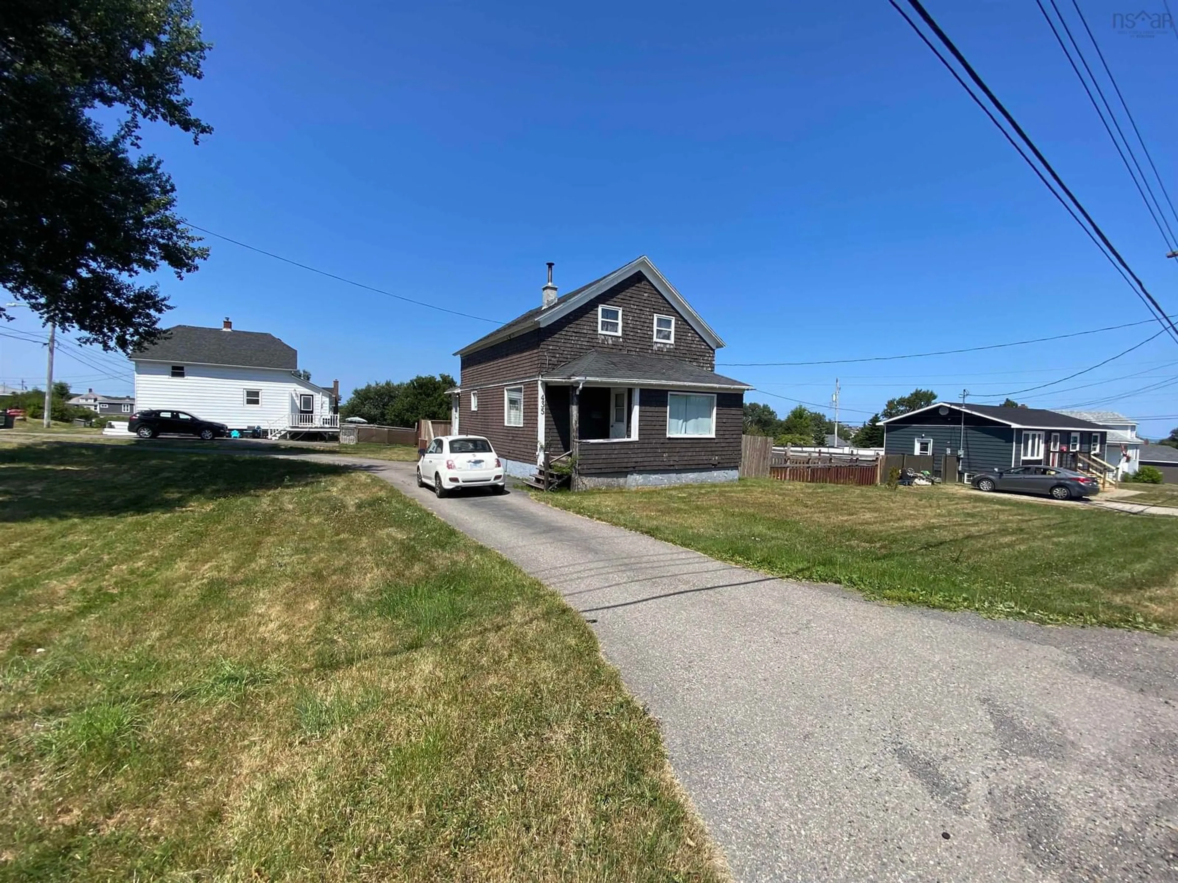 A pic from outside/outdoor area/front of a property/back of a property/a pic from drone, street for 435 Mahon St, New Waterford Nova Scotia B1H 2A5