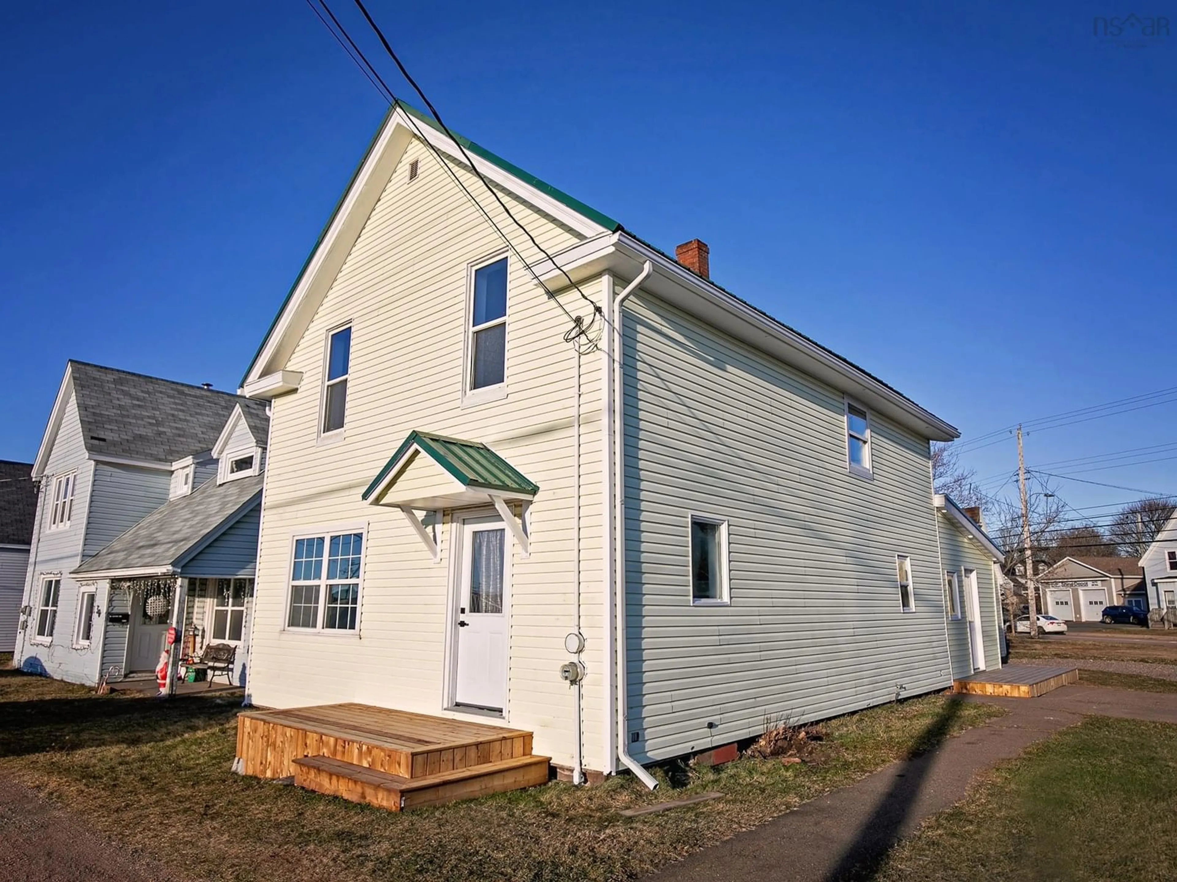 Home with vinyl exterior material, street for 32 Douglas Ave, Amherst Nova Scotia B4H 3E6