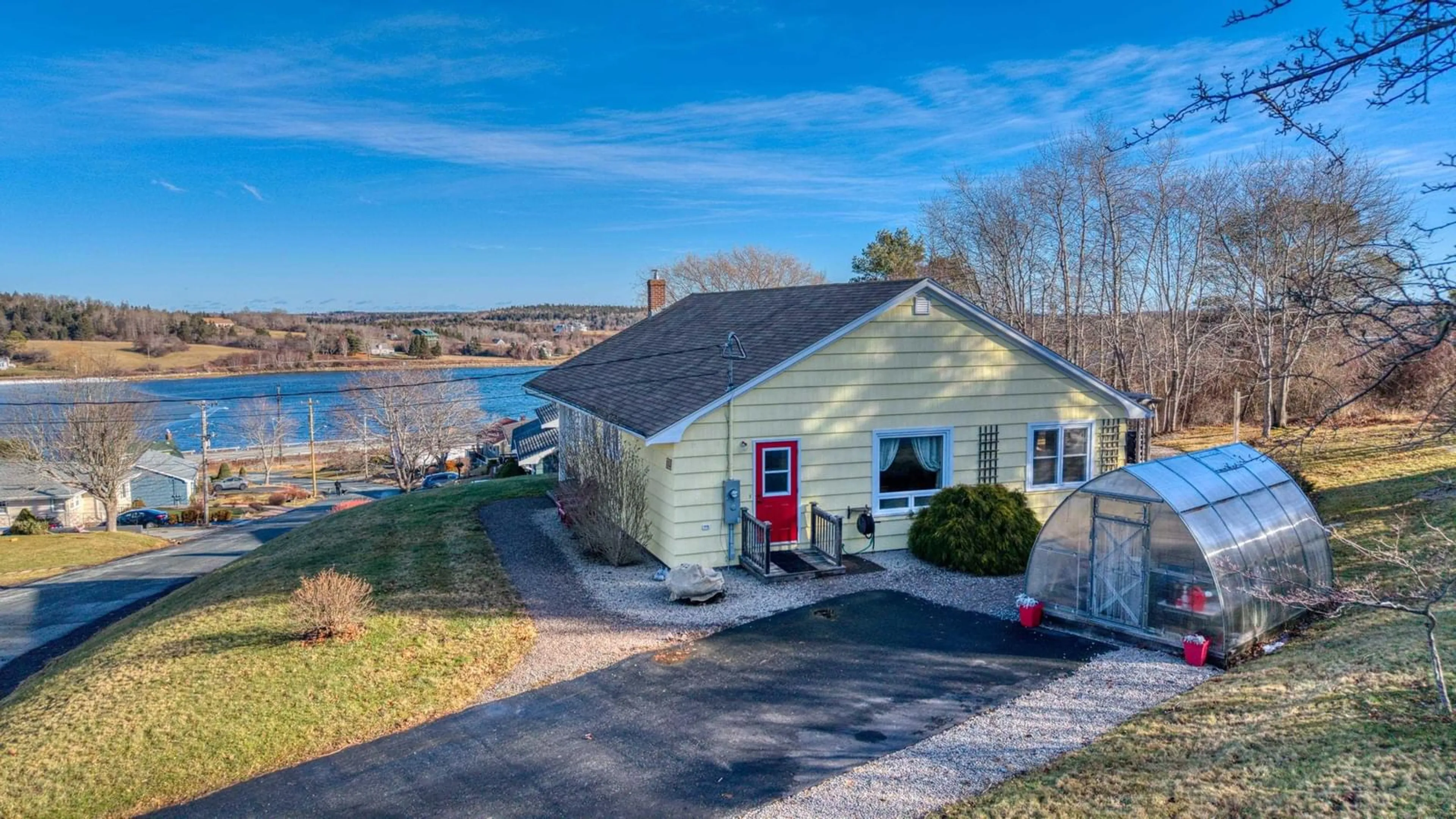 A pic from outside/outdoor area/front of a property/back of a property/a pic from drone, water/lake/river/ocean view for 112 Hopson St, Lunenburg Nova Scotia B0J 2C0