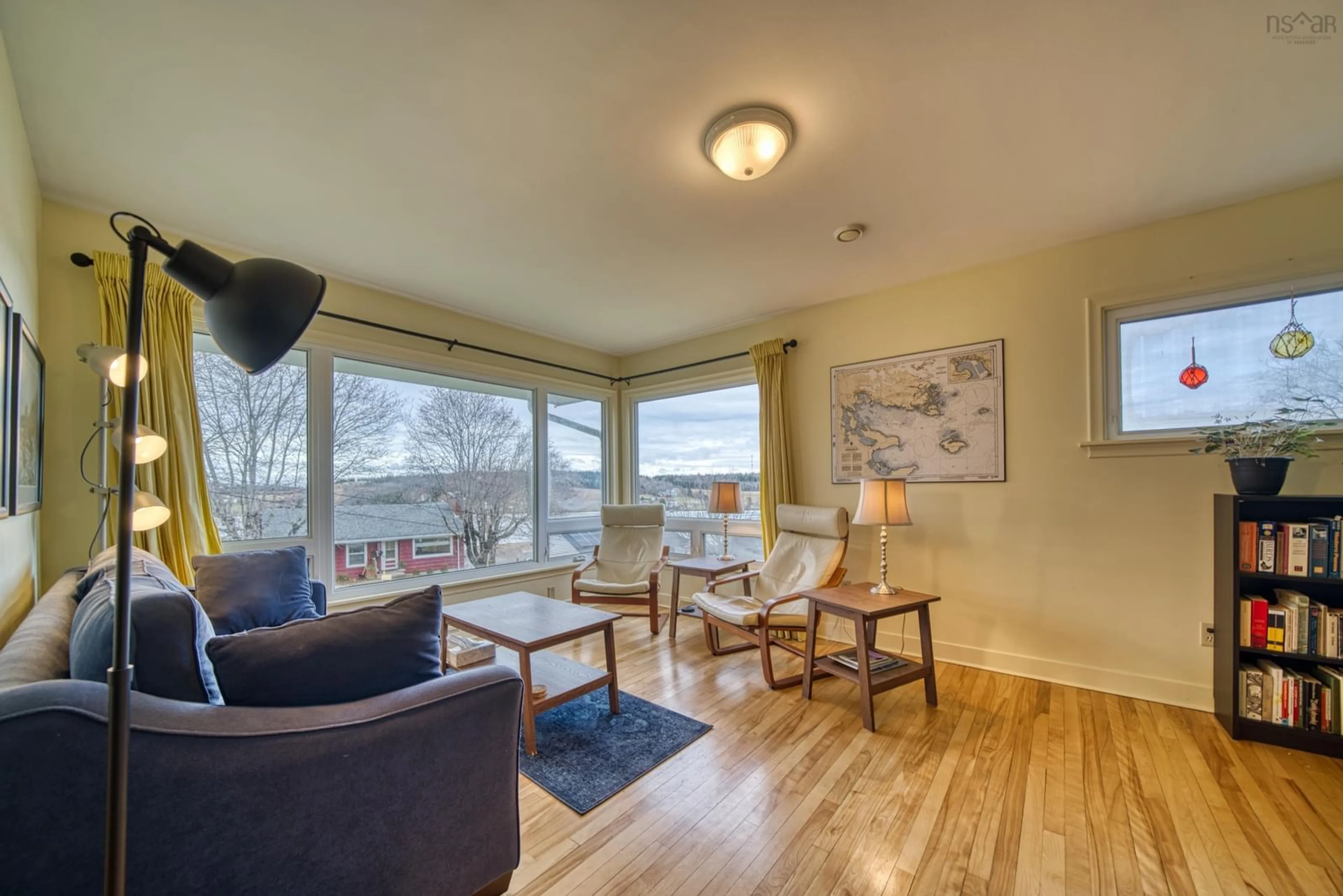 Living room with furniture, wood/laminate floor for 112 Hopson St, Lunenburg Nova Scotia B0J 2C0
