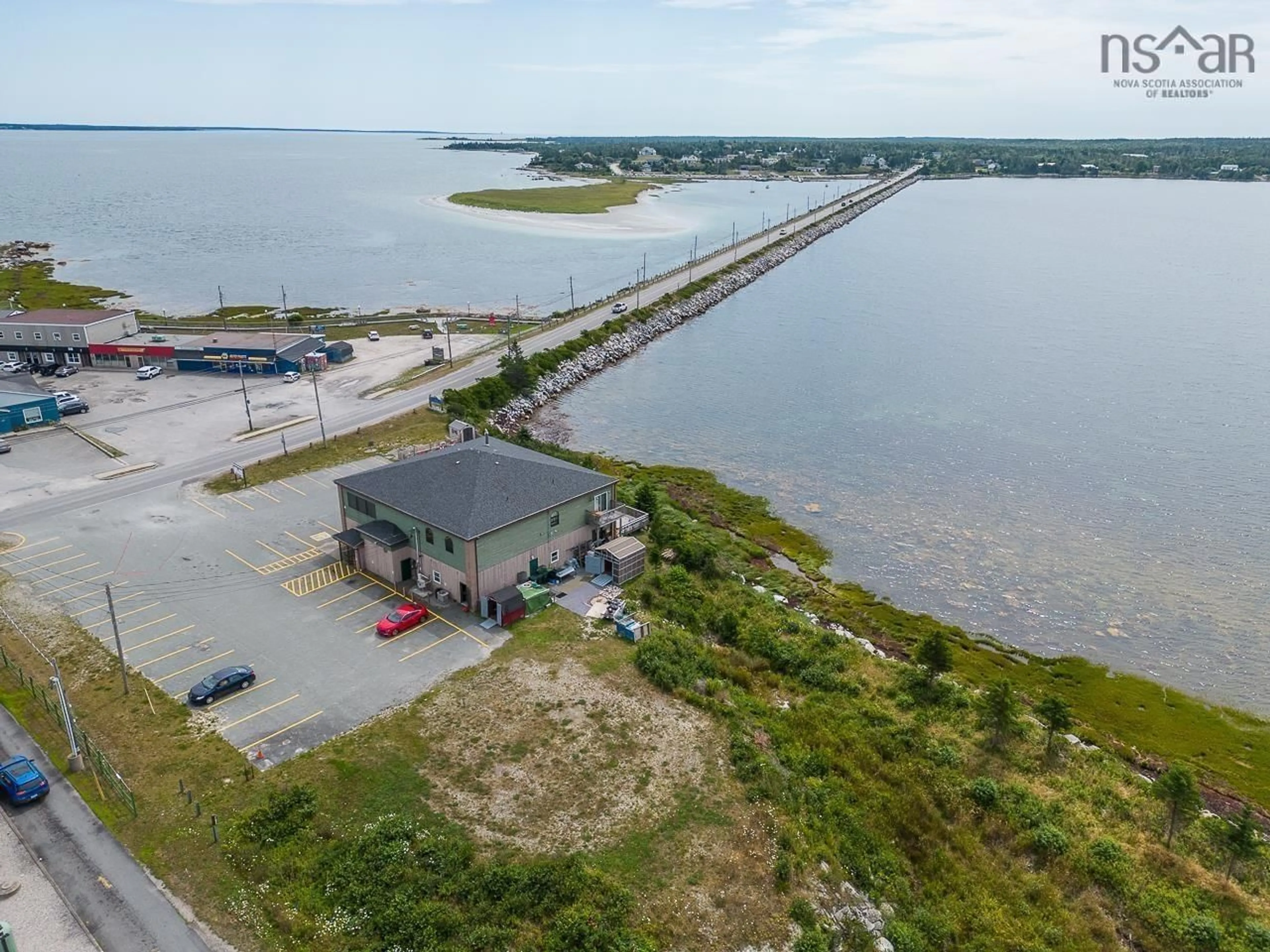 A pic from outside/outdoor area/front of a property/back of a property/a pic from drone, water/lake/river/ocean view for 42 Highway 330, Barrington Passage Nova Scotia B0W 1G0