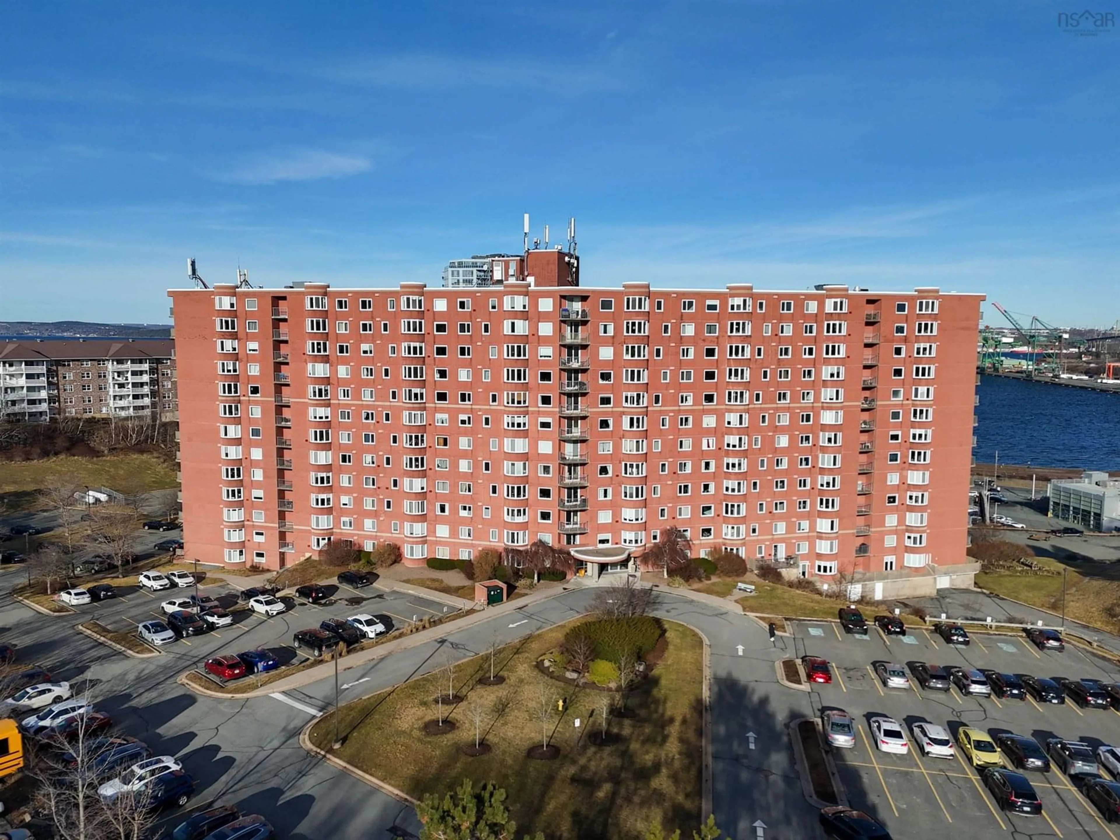 A pic from outside/outdoor area/front of a property/back of a property/a pic from drone, city buildings view from balcony for 45 Vimy Ave #123, Halifax Nova Scotia B3M 4C5