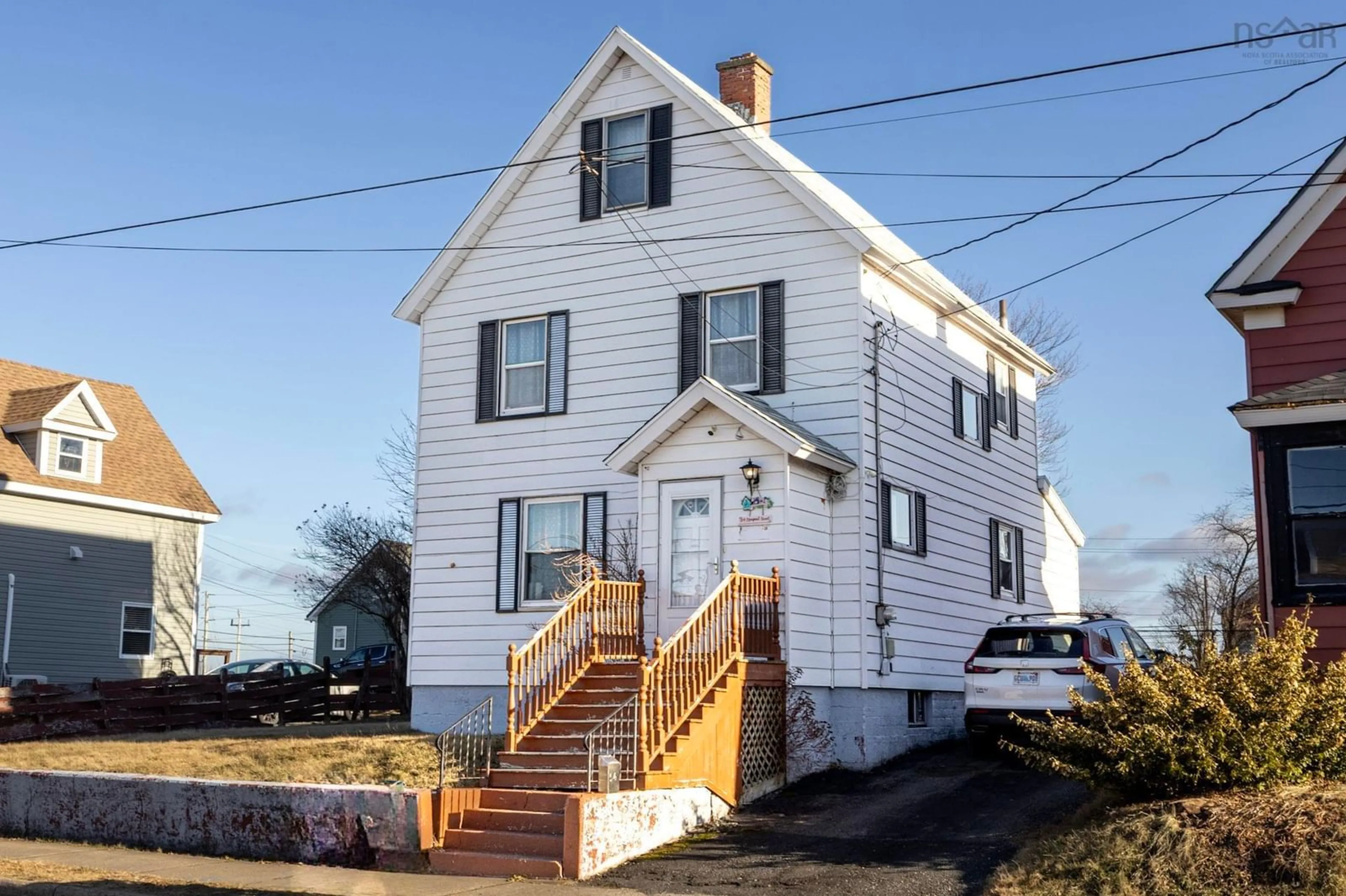 Home with vinyl exterior material, street for 54 Margaret St, Sydney Nova Scotia B1P 5W1