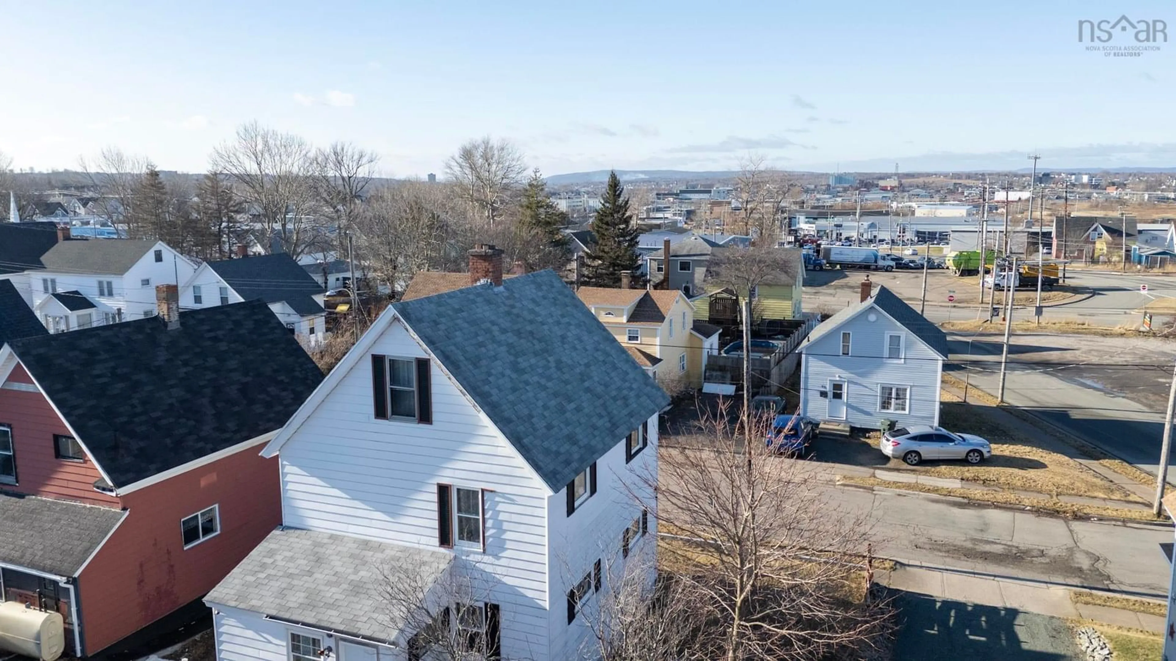 A pic from outside/outdoor area/front of a property/back of a property/a pic from drone, unknown for 54 Margaret St, Sydney Nova Scotia B1P 5W1