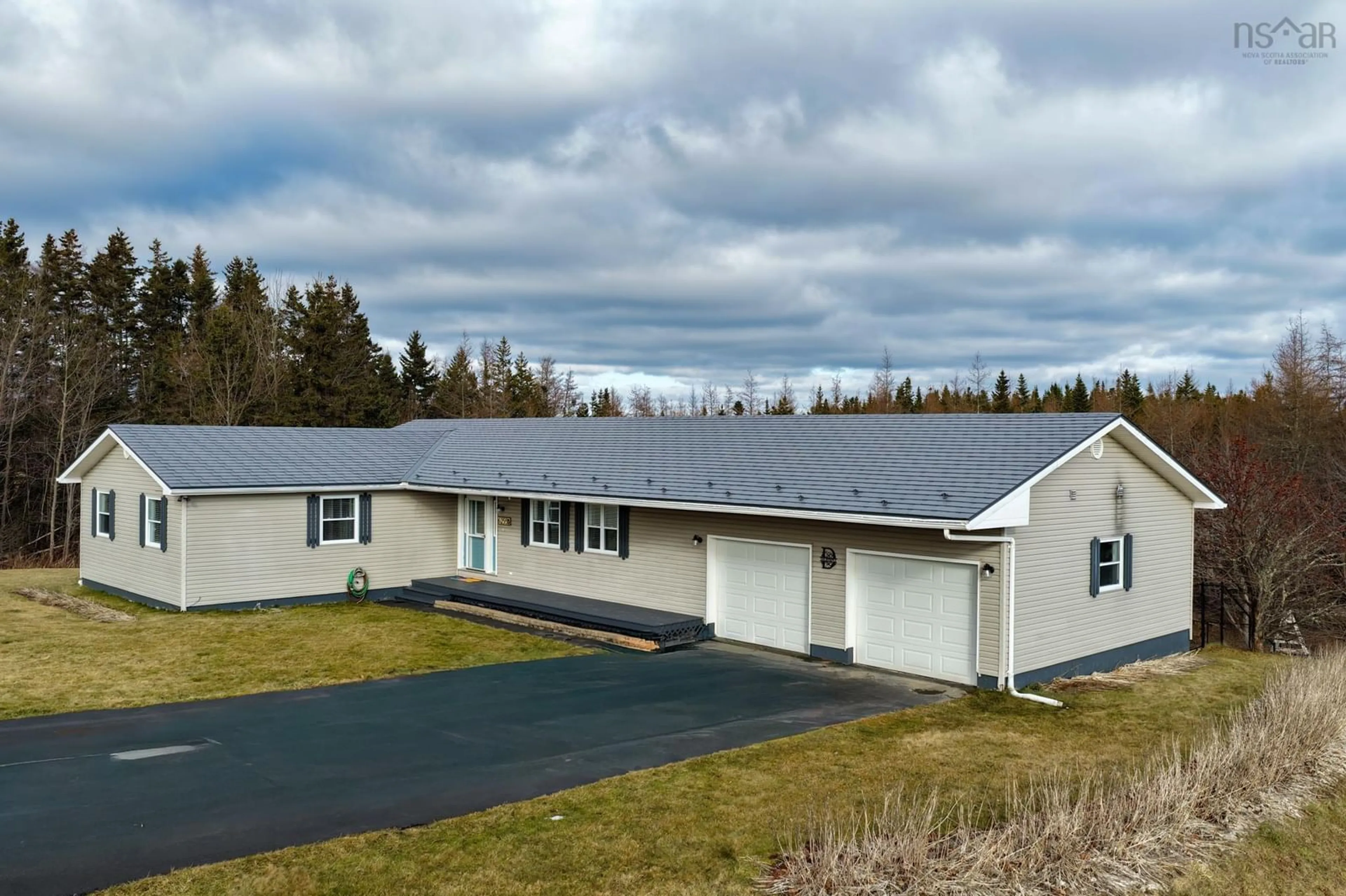 A pic from outside/outdoor area/front of a property/back of a property/a pic from drone, building for 6255 Grand Mira North Rd, Grand Mira North Nova Scotia B1K 1N7