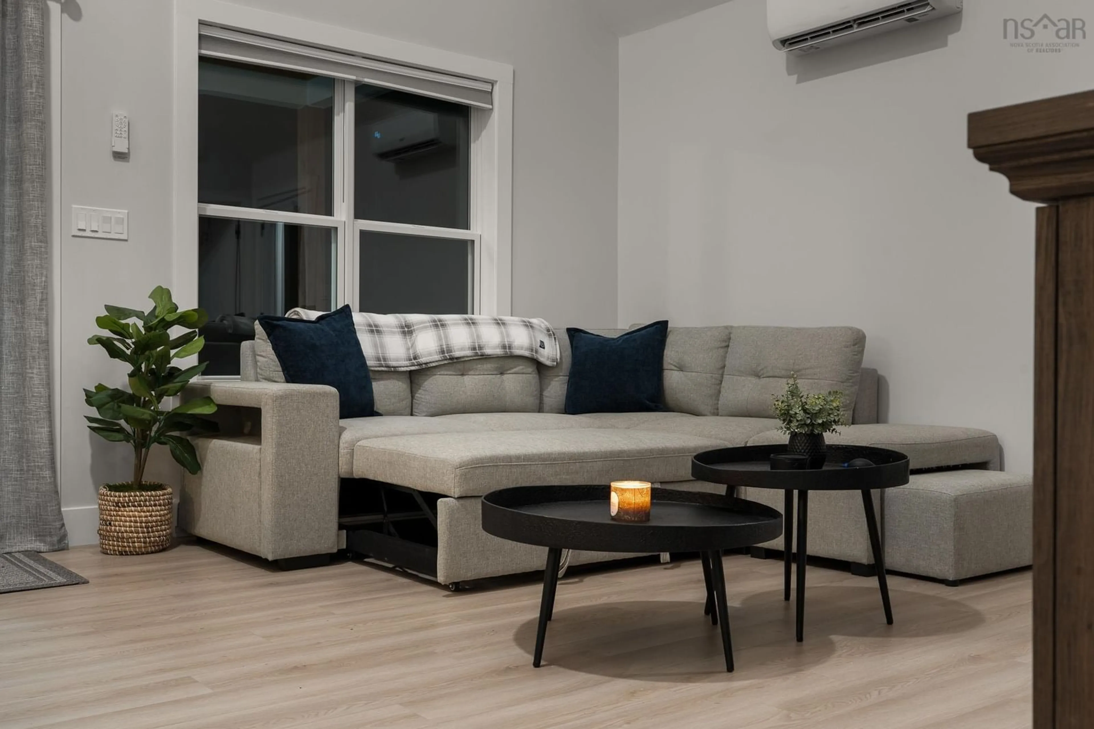 Living room with furniture, wood/laminate floor for 41 Murphy Lane, Vaughan Nova Scotia B0N 2T0