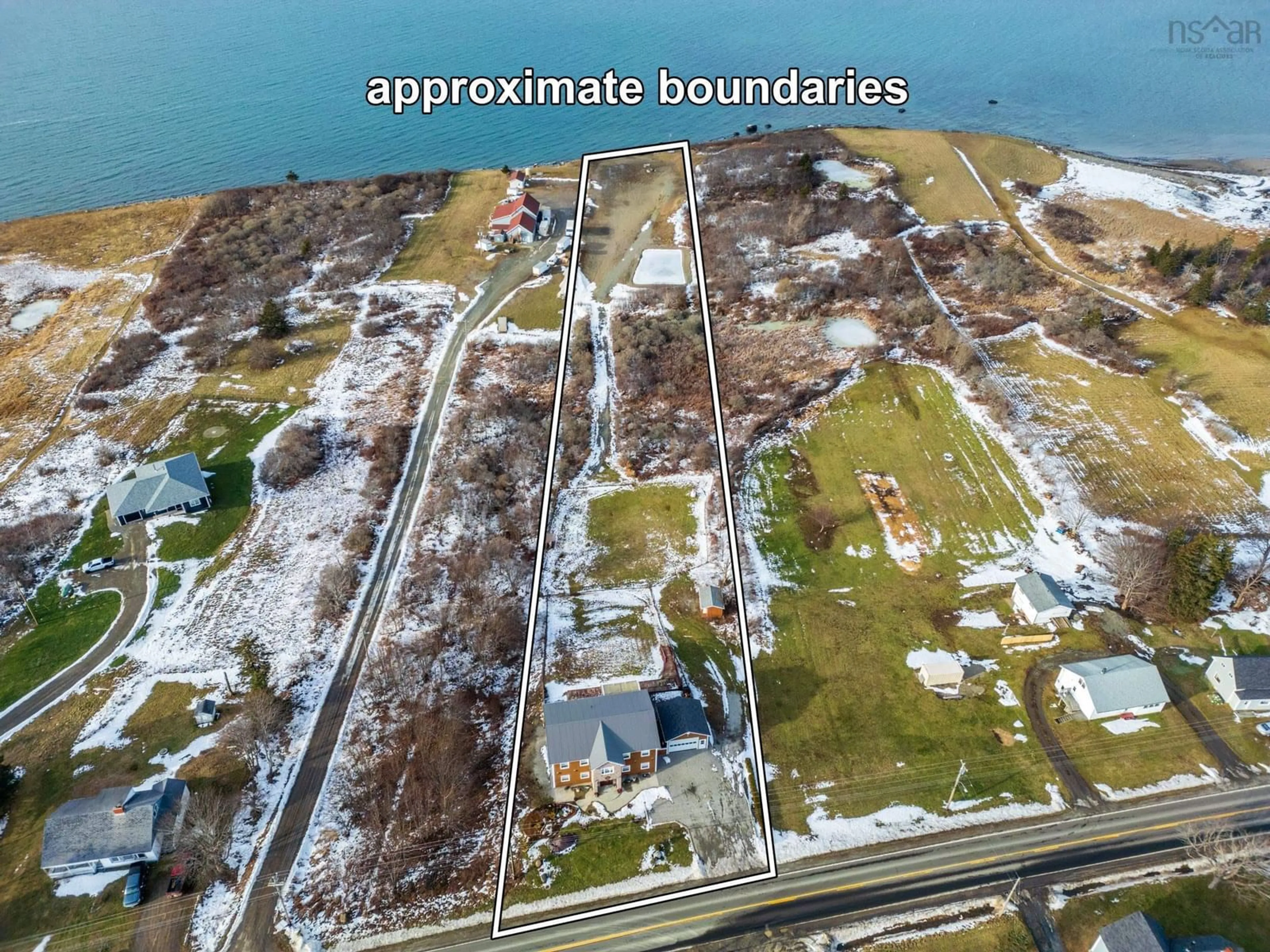 A pic from outside/outdoor area/front of a property/back of a property/a pic from drone, water/lake/river/ocean view for 3387 Highway 1, Belliveaus Cove Nova Scotia B0W 3T0