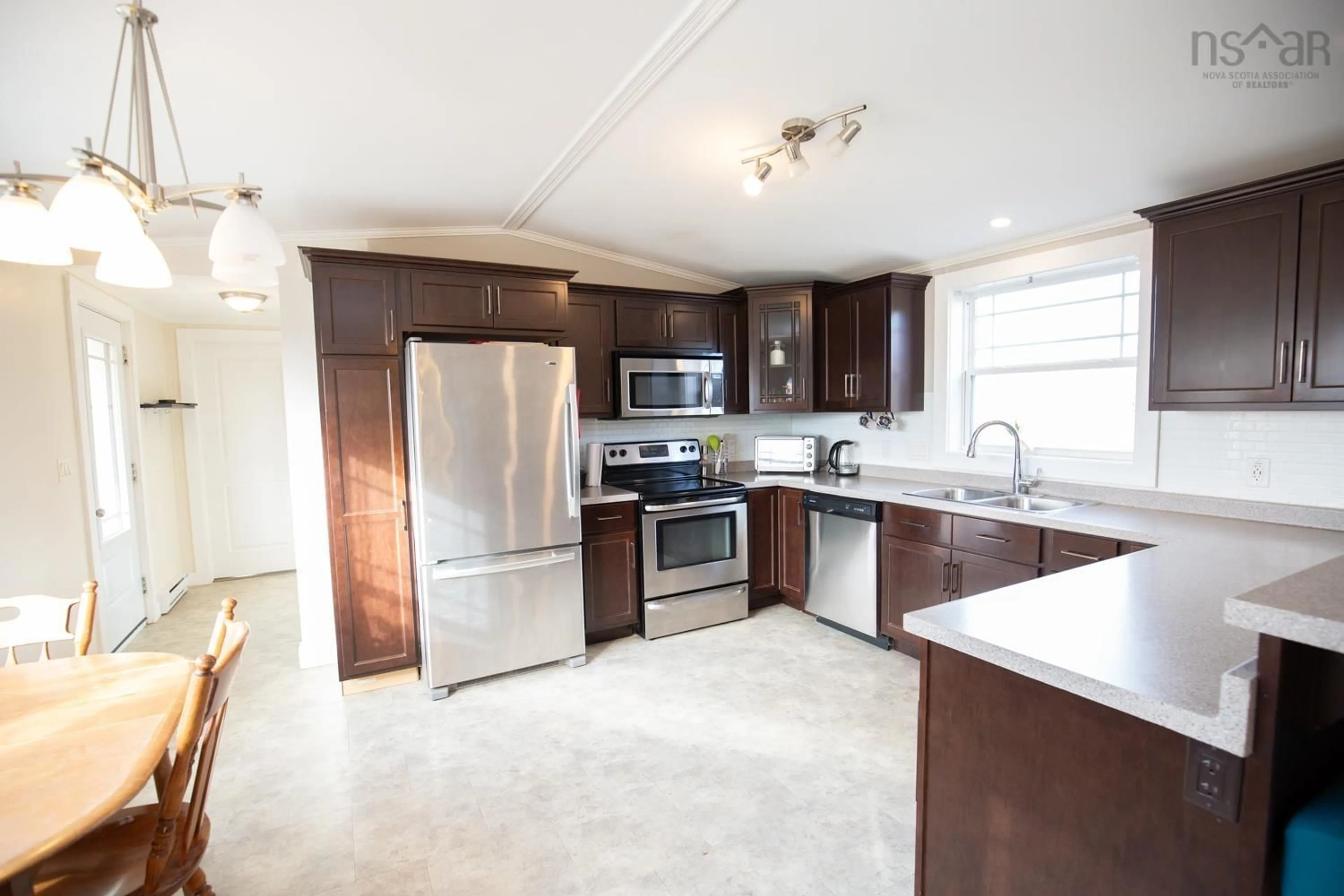 Open concept kitchen, ceramic/tile floor for 6869 Highway 2, Portapique Nova Scotia B0M 1B0