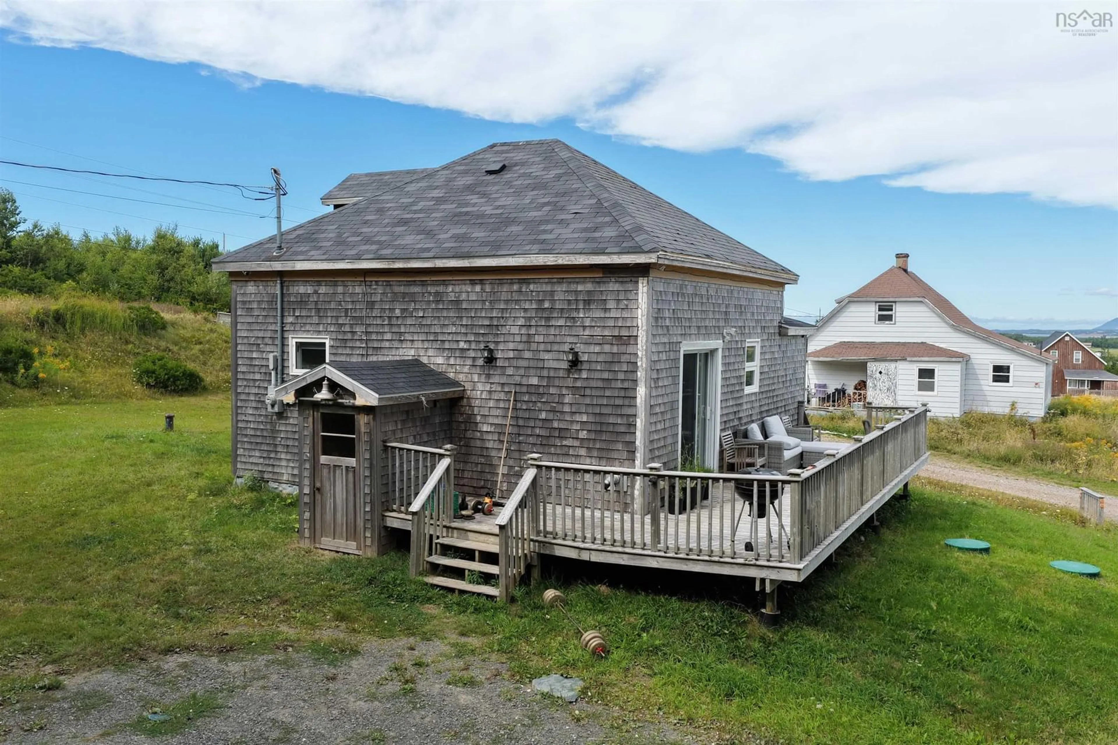 A pic from outside/outdoor area/front of a property/back of a property/a pic from drone, building for 12364 Cabot Trail, St. Joseph du Moine Nova Scotia B0E 3A0