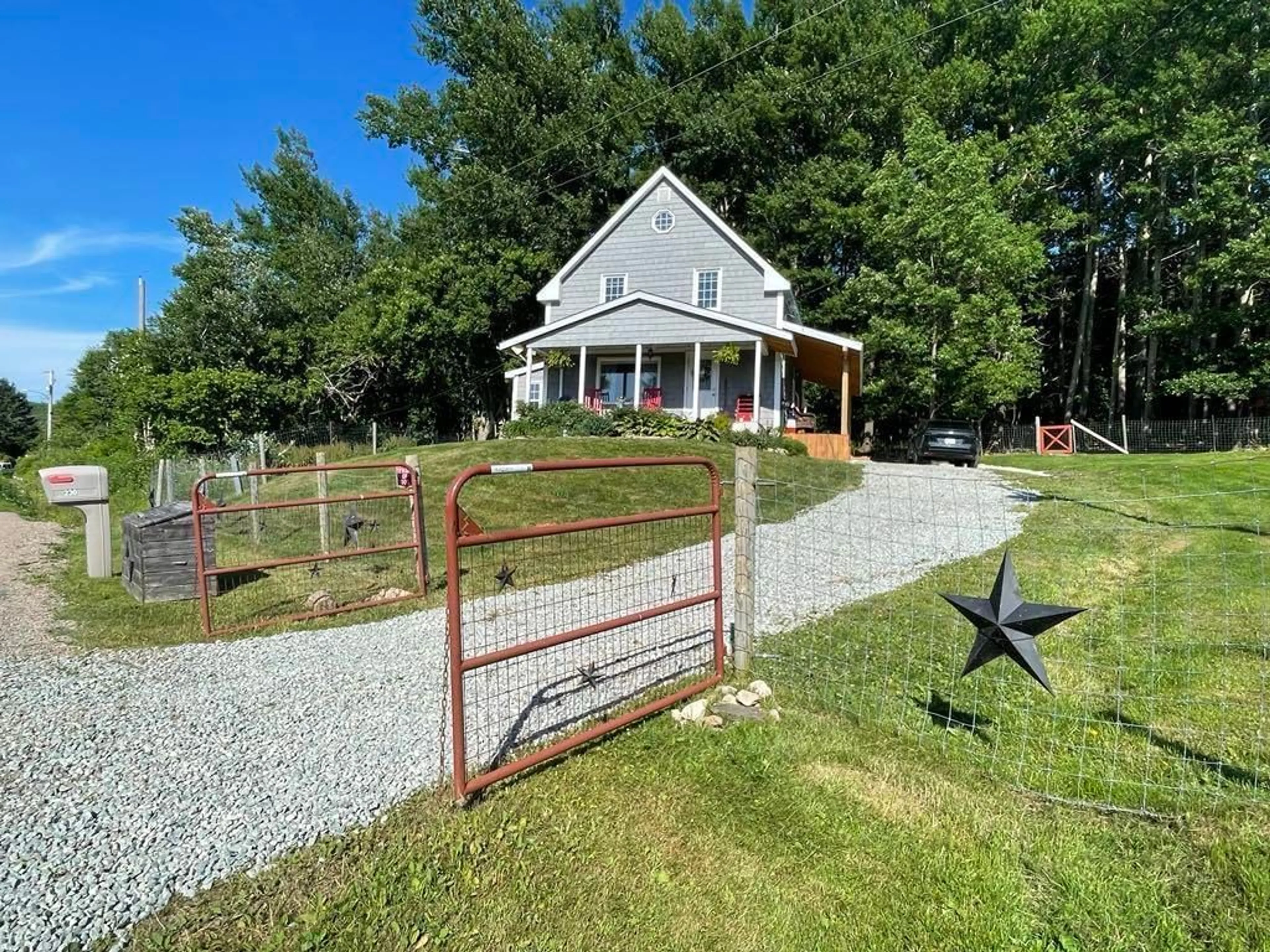 A pic from outside/outdoor area/front of a property/back of a property/a pic from drone, unknown for 230 Arsenaults Hill Rd, Margaree Nova Scotia B0E 2B0