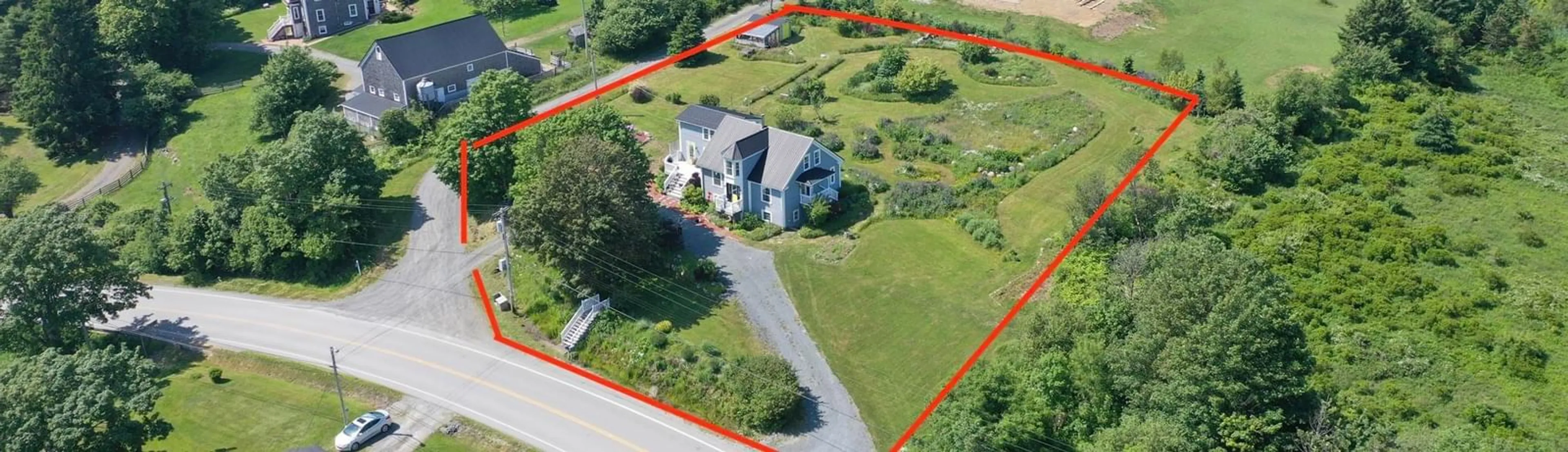 A pic from outside/outdoor area/front of a property/back of a property/a pic from drone, street for 647 Blue Rocks Rd, Garden Lots Nova Scotia B0J 2C0