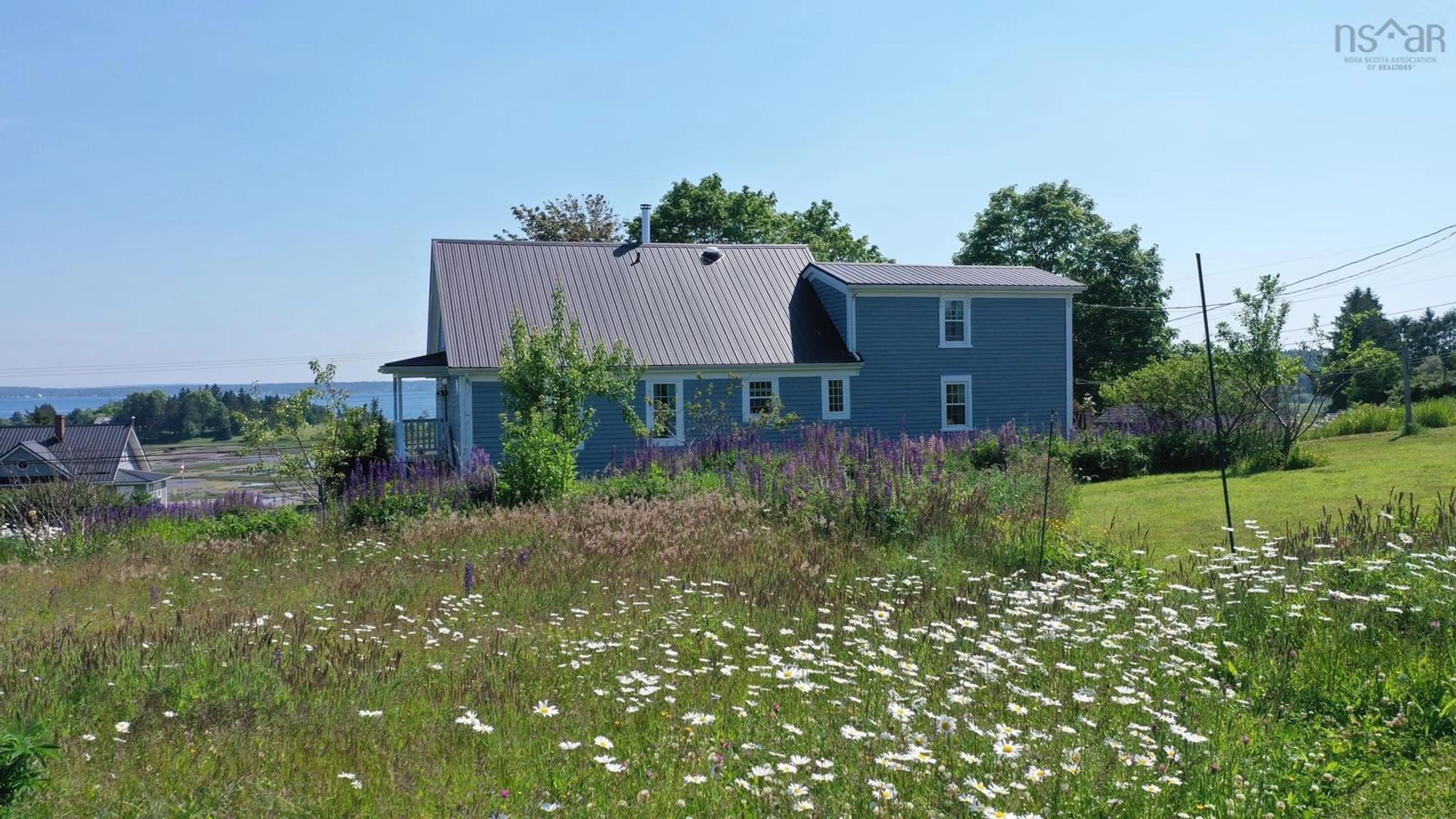 Home with vinyl exterior material, water/lake/river/ocean view for 647 Blue Rocks Rd, Garden Lots Nova Scotia B0J 2C0