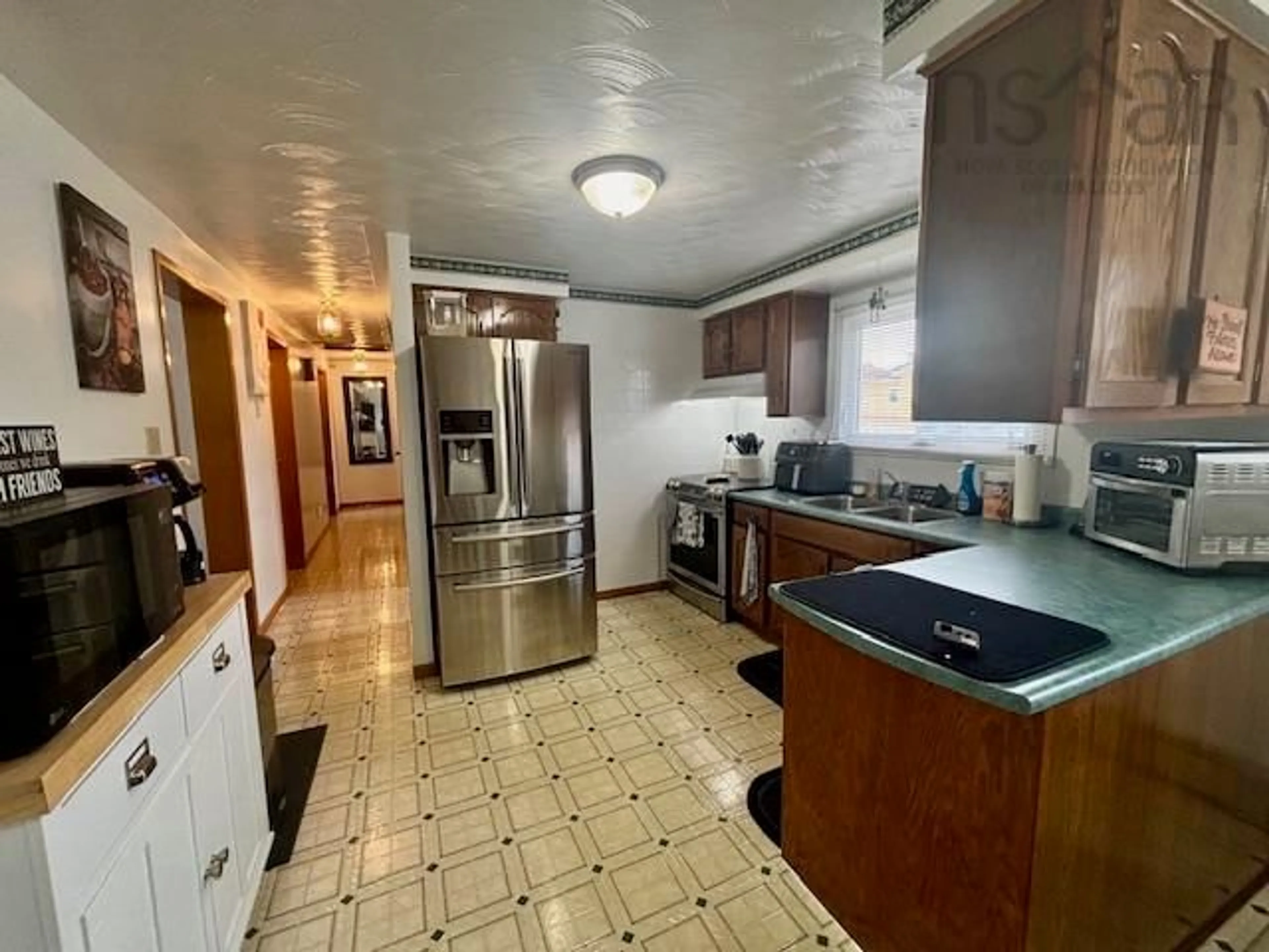 Kitchen with laundary machines, unknown for 9 King St, Scotchtown Nova Scotia B1H 1C3