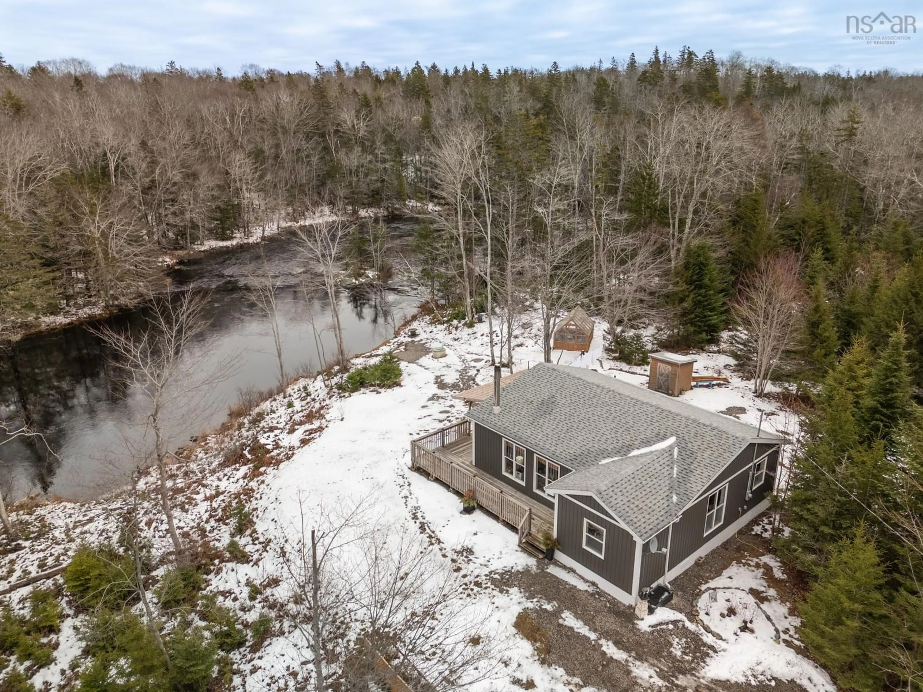A pic from outside/outdoor area/front of a property/back of a property/a pic from drone, water/lake/river/ocean view for 55 Carleton River Rd, Carleton Nova Scotia B5A 0H3