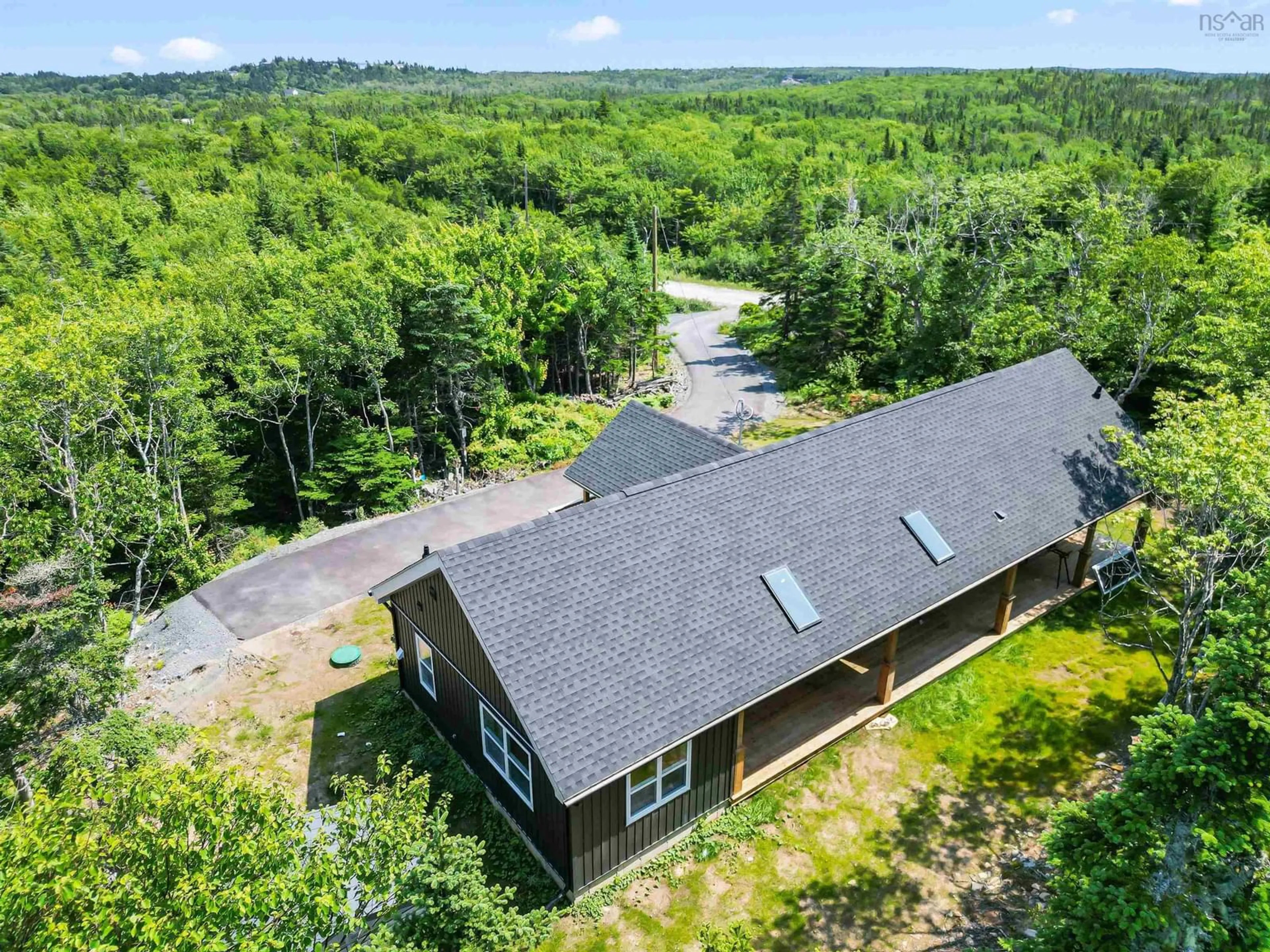 A pic from outside/outdoor area/front of a property/back of a property/a pic from drone, forest/trees view for 99 Wilderness Dr, Portuguese Cove Nova Scotia B3V 1N5