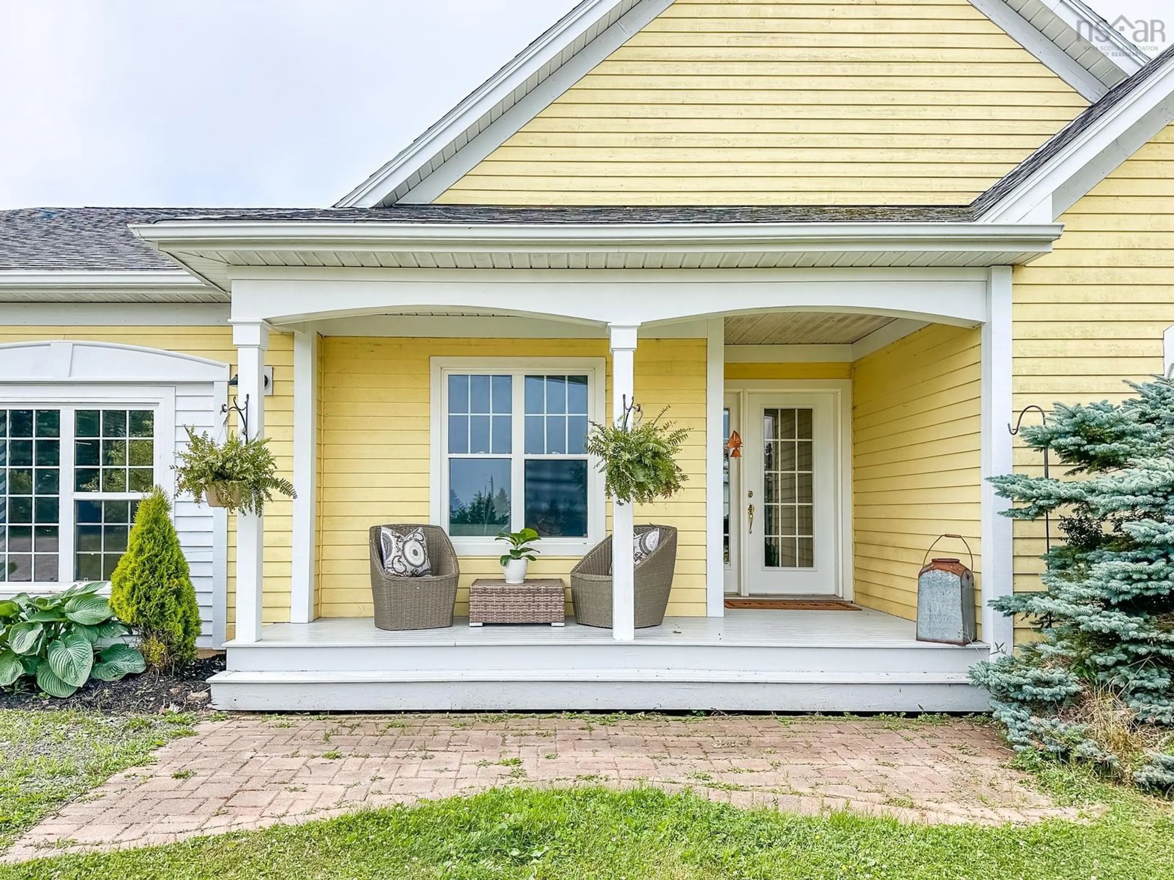 Home with vinyl exterior material, street for 3419 Highway 359, Halls Harbour Nova Scotia B0P 1J0