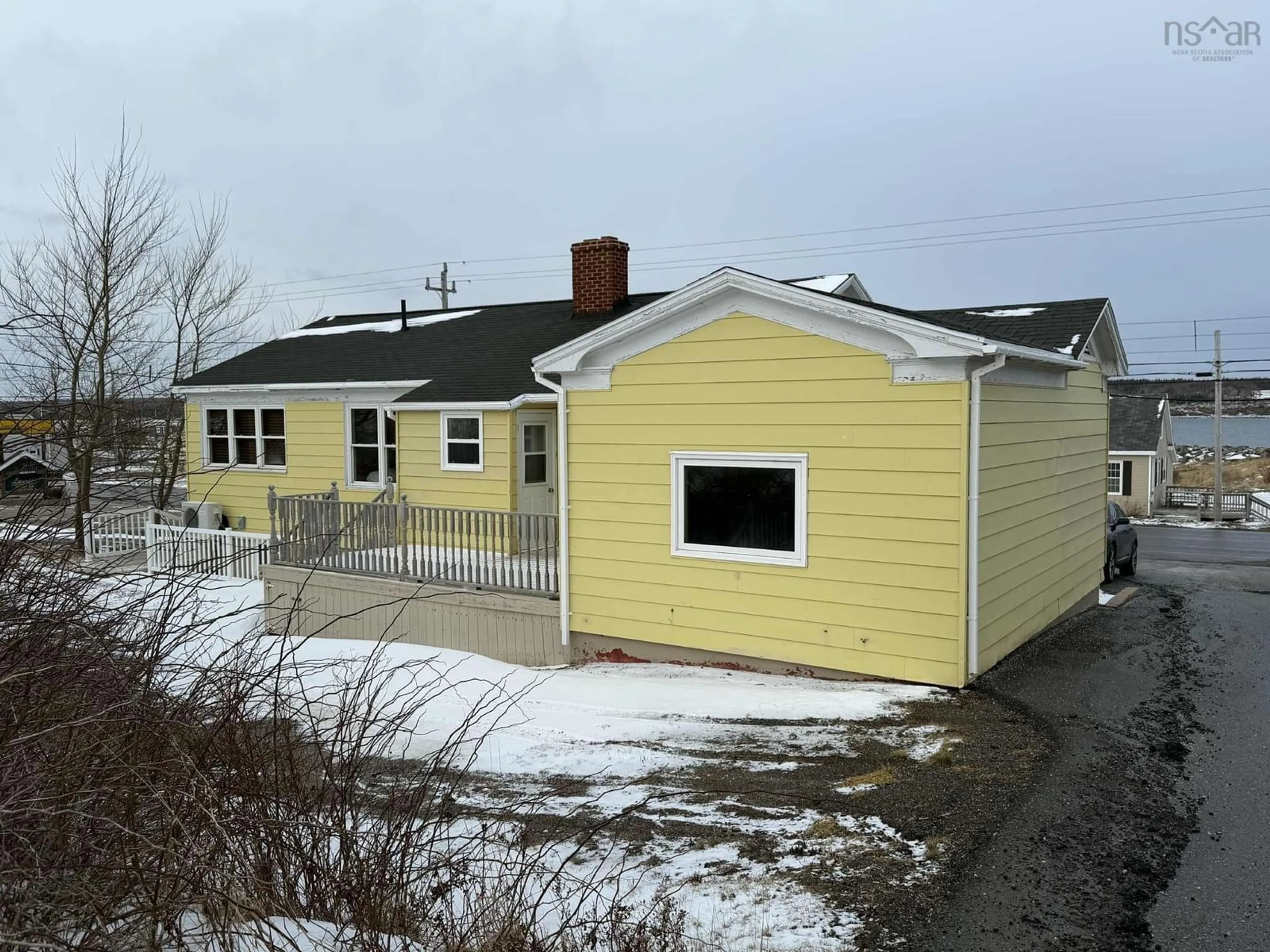 Home with vinyl exterior material, building for 15472 Cabot Trail, Chéticamp Nova Scotia B0E 1H0