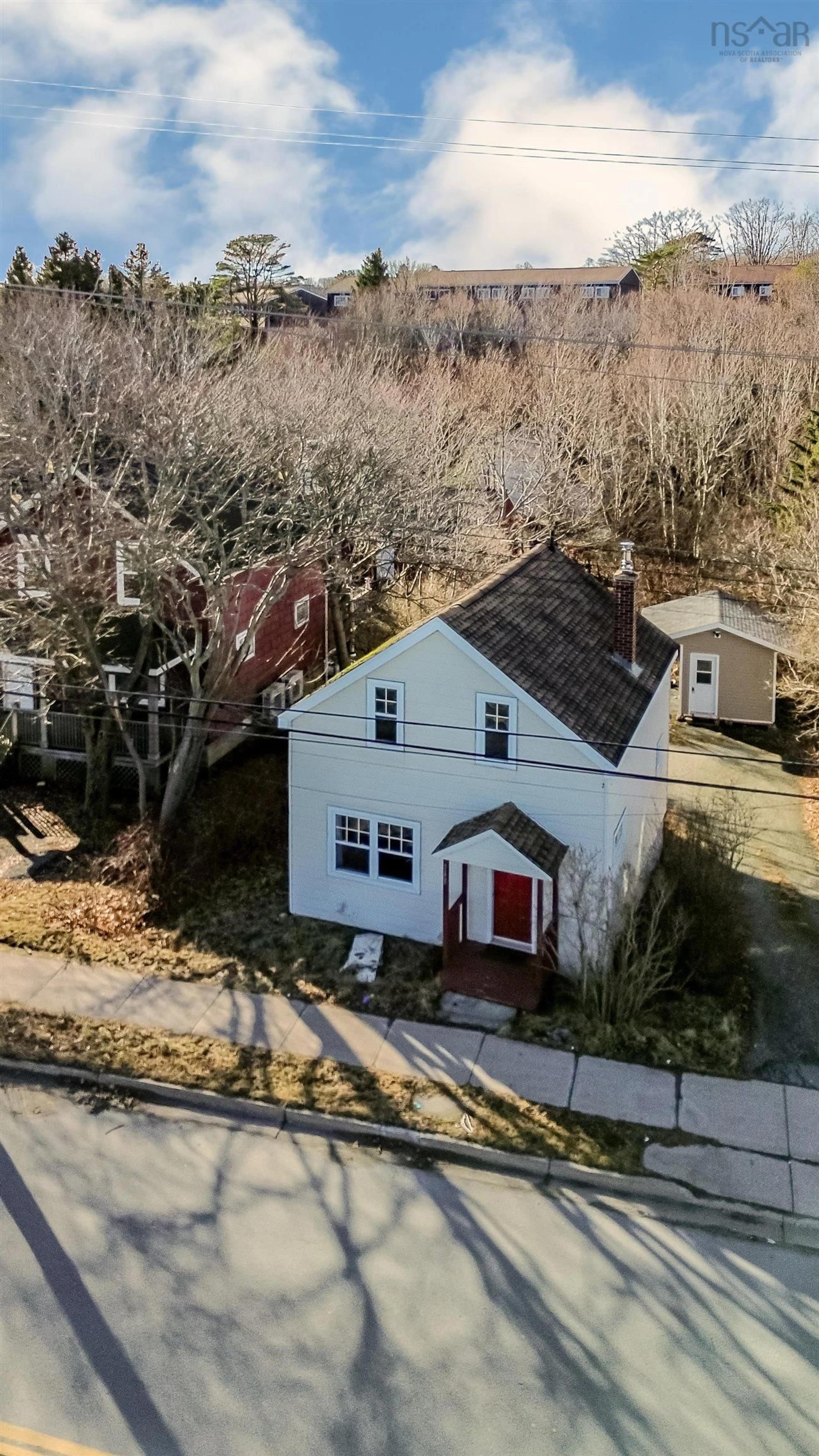 A pic from outside/outdoor area/front of a property/back of a property/a pic from drone, street for 141 Herring Cove Rd, Armdale Nova Scotia B3P 1K6