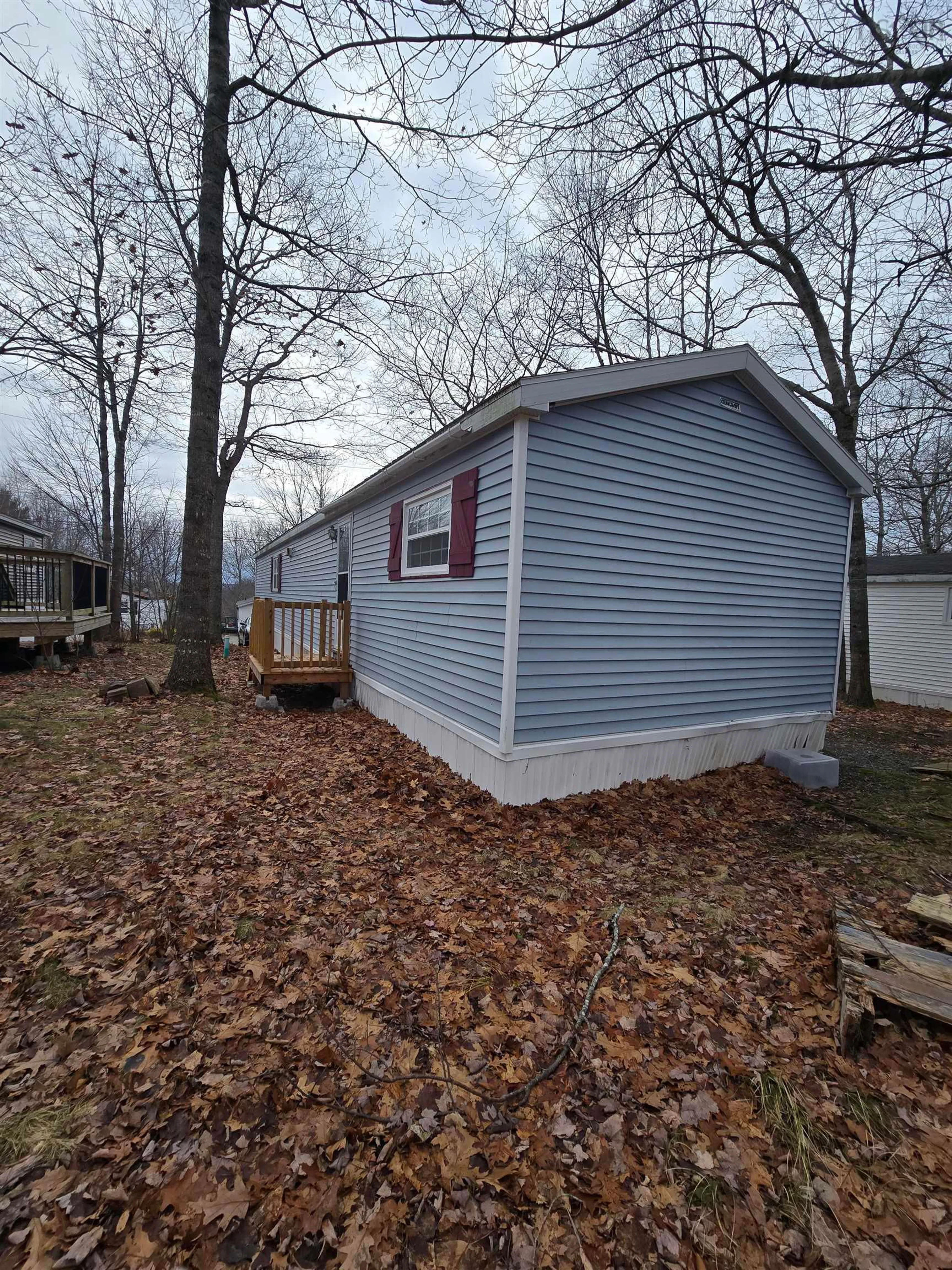 Home with vinyl exterior material, street for 16 Autumn St, Bridgewater Nova Scotia B4V 3S8