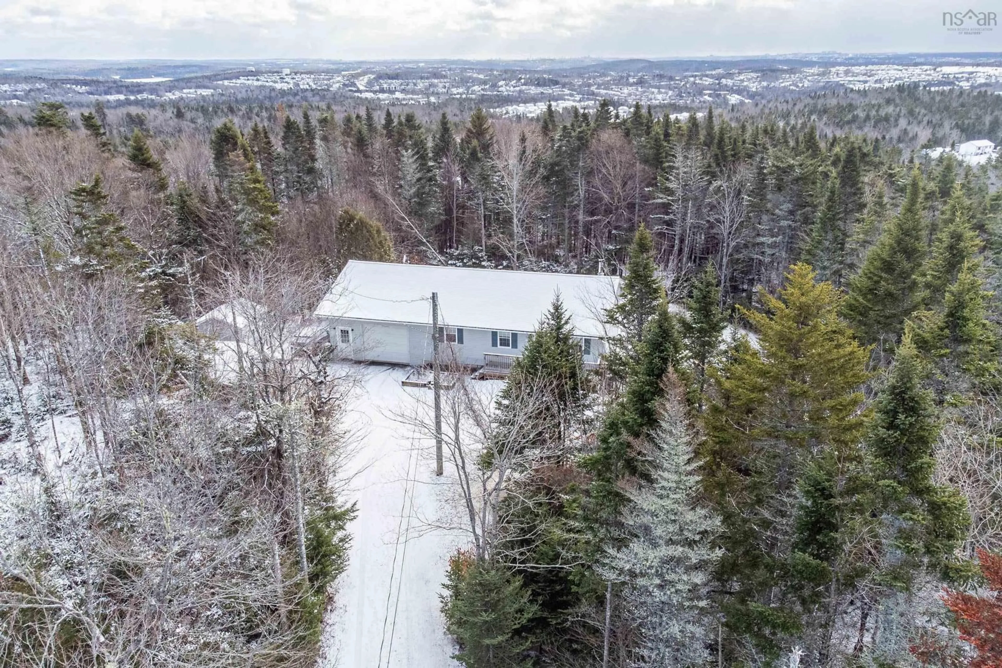 A pic from outside/outdoor area/front of a property/back of a property/a pic from drone, forest/trees view for 94 Snowberry Lane, Middle Sackville Nova Scotia B4E 3H6