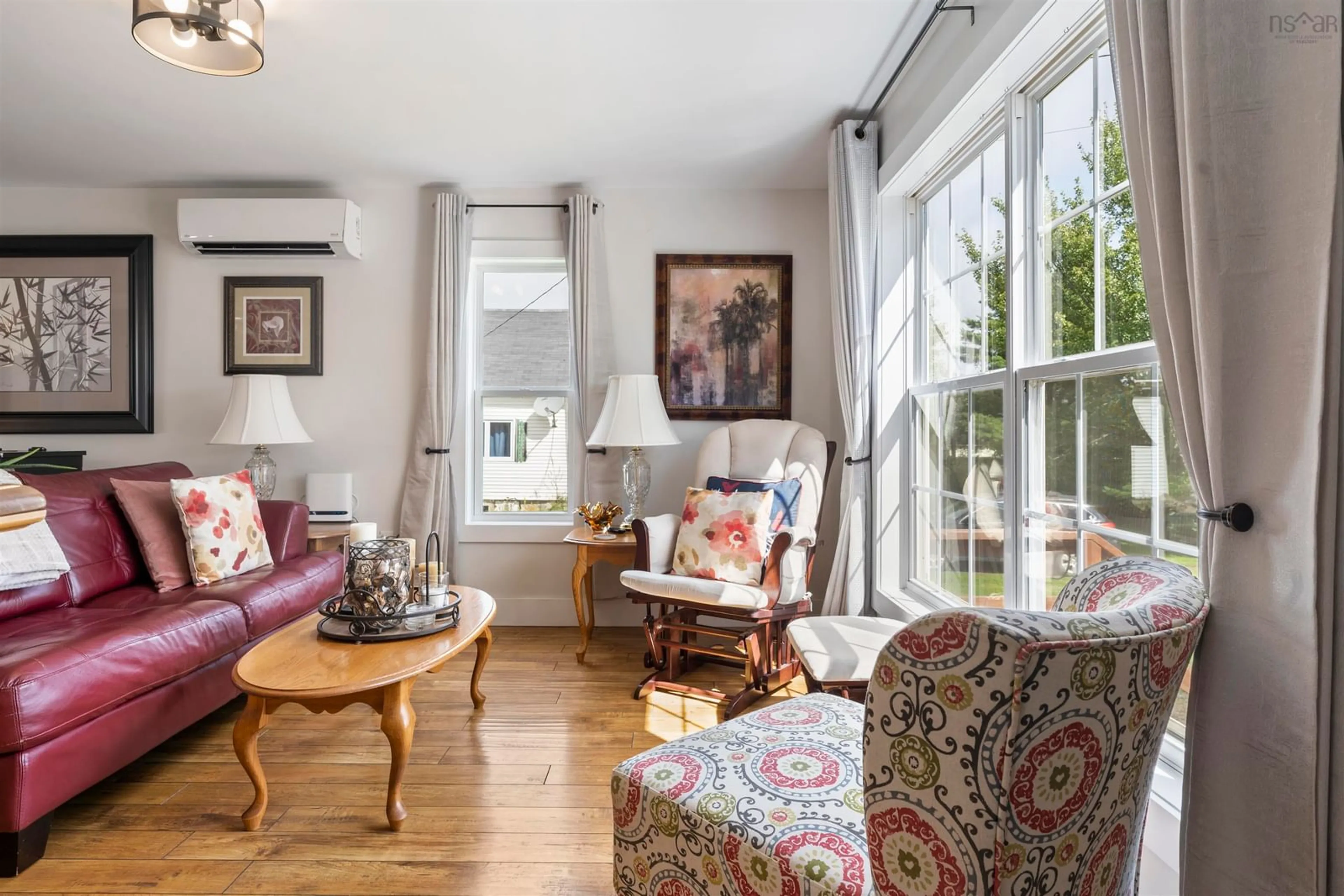 Living room with furniture, wood/laminate floor for 57 Highway 336, Upper Musquodoboit Nova Scotia B0N 2M0