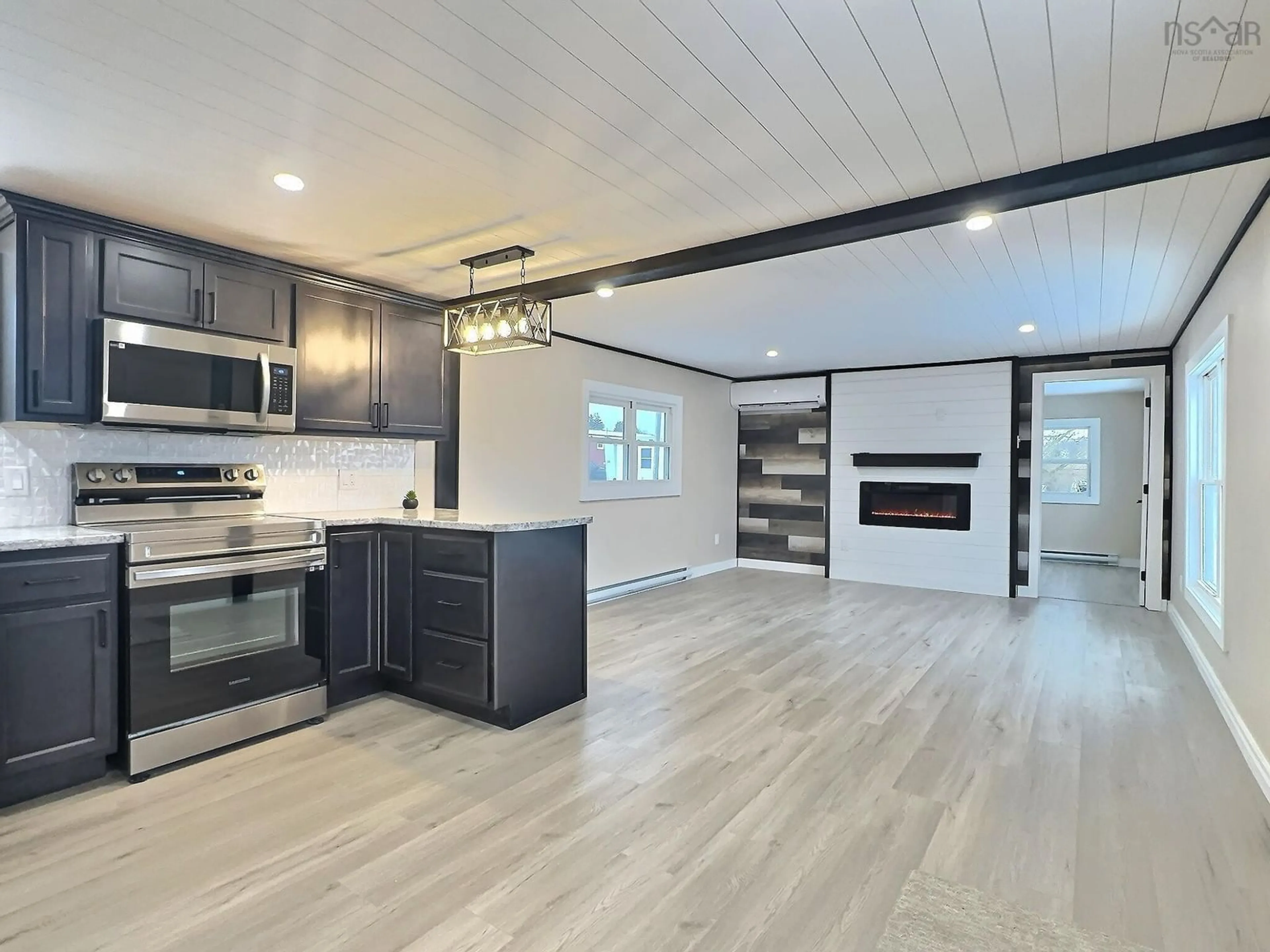 Open concept kitchen, wood/laminate floor for 31 Butler Dr, Bible Hill Nova Scotia B2N 5M9