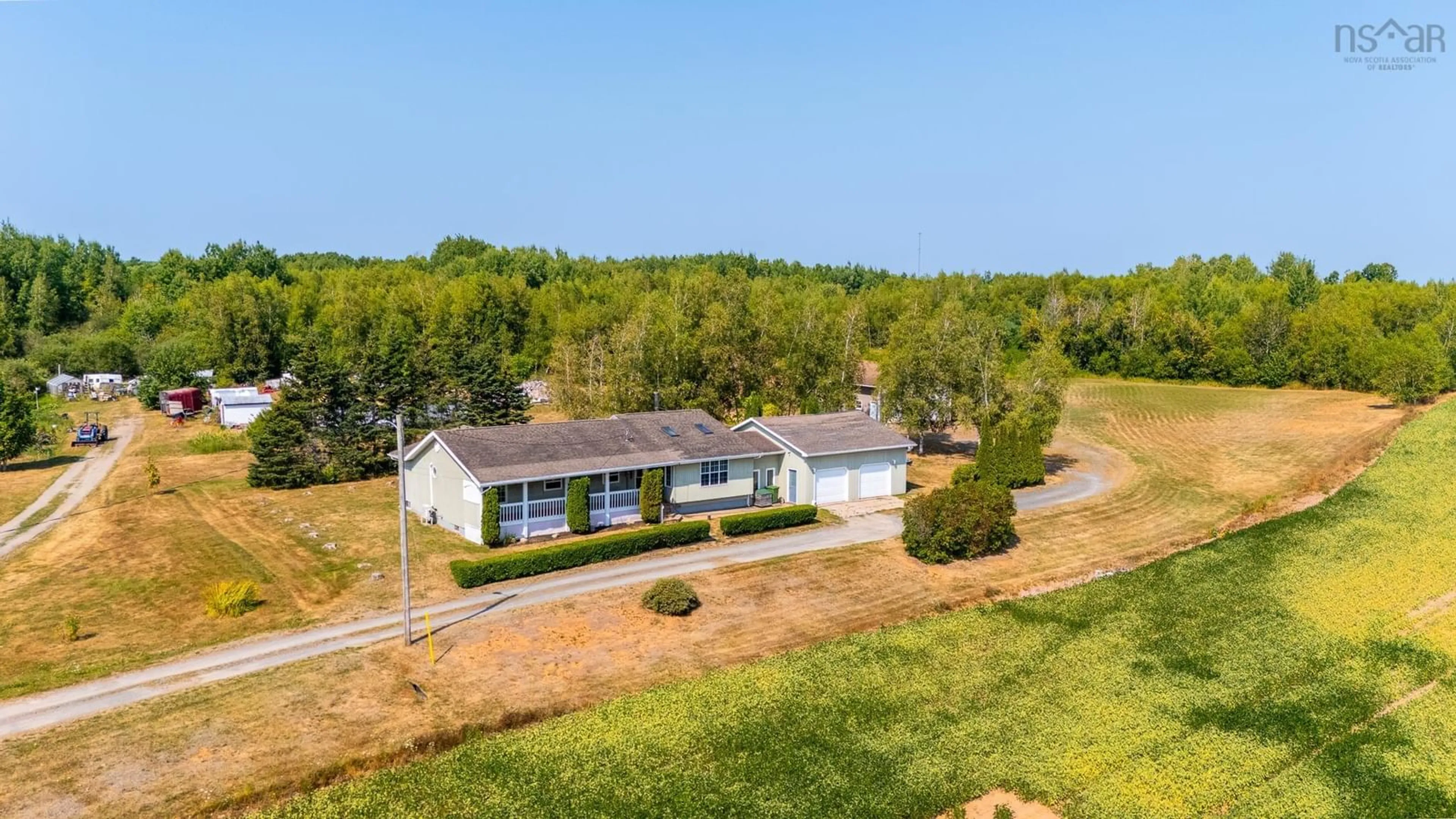 A pic from outside/outdoor area/front of a property/back of a property/a pic from drone, water/lake/river/ocean view for 1477 Lakewood Rd, Steam Mill Nova Scotia B4N 3V7