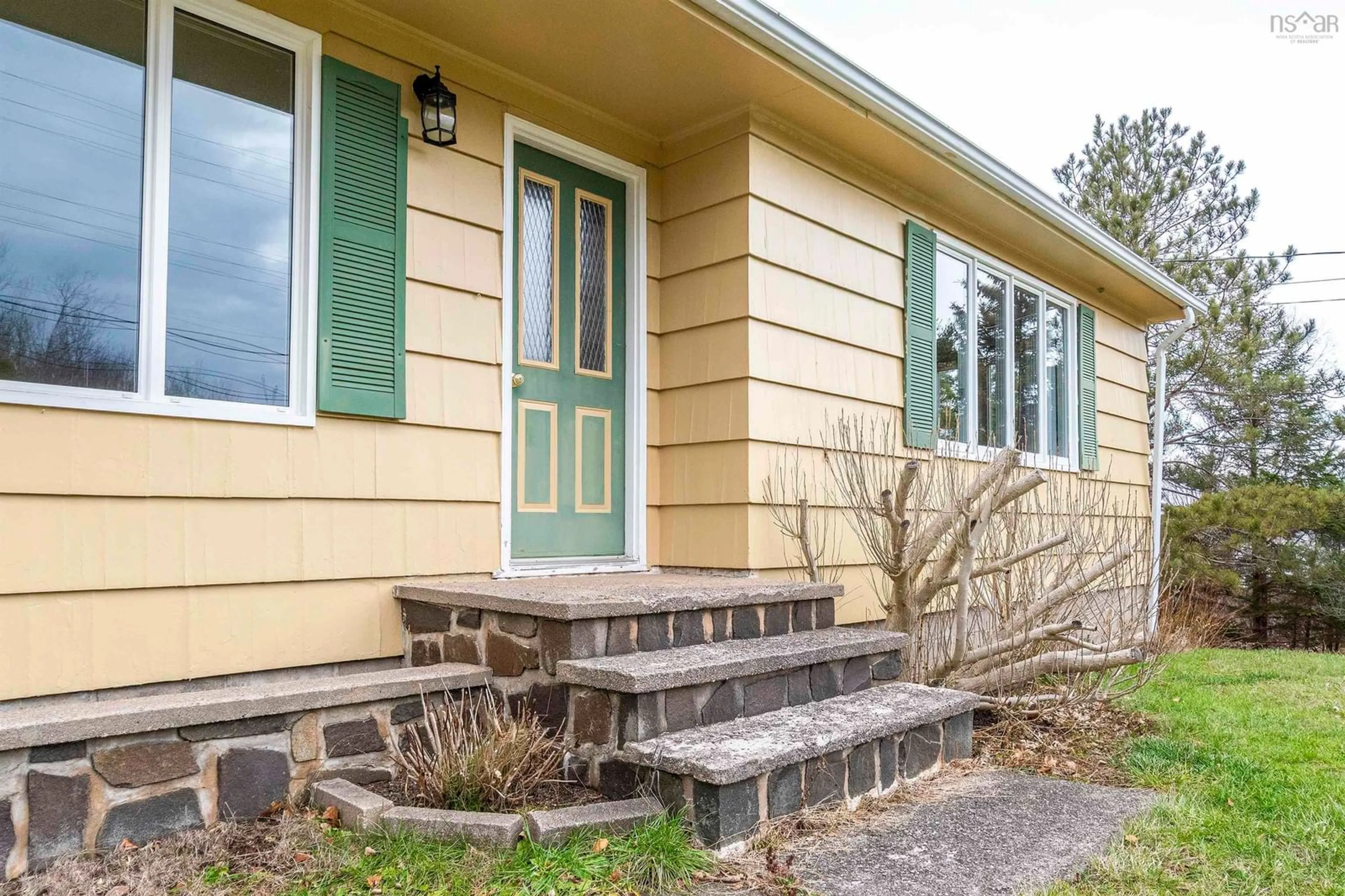 Home with vinyl exterior material, street for 4231 Shore Rd, Parkers Cove Nova Scotia B0S 1A0
