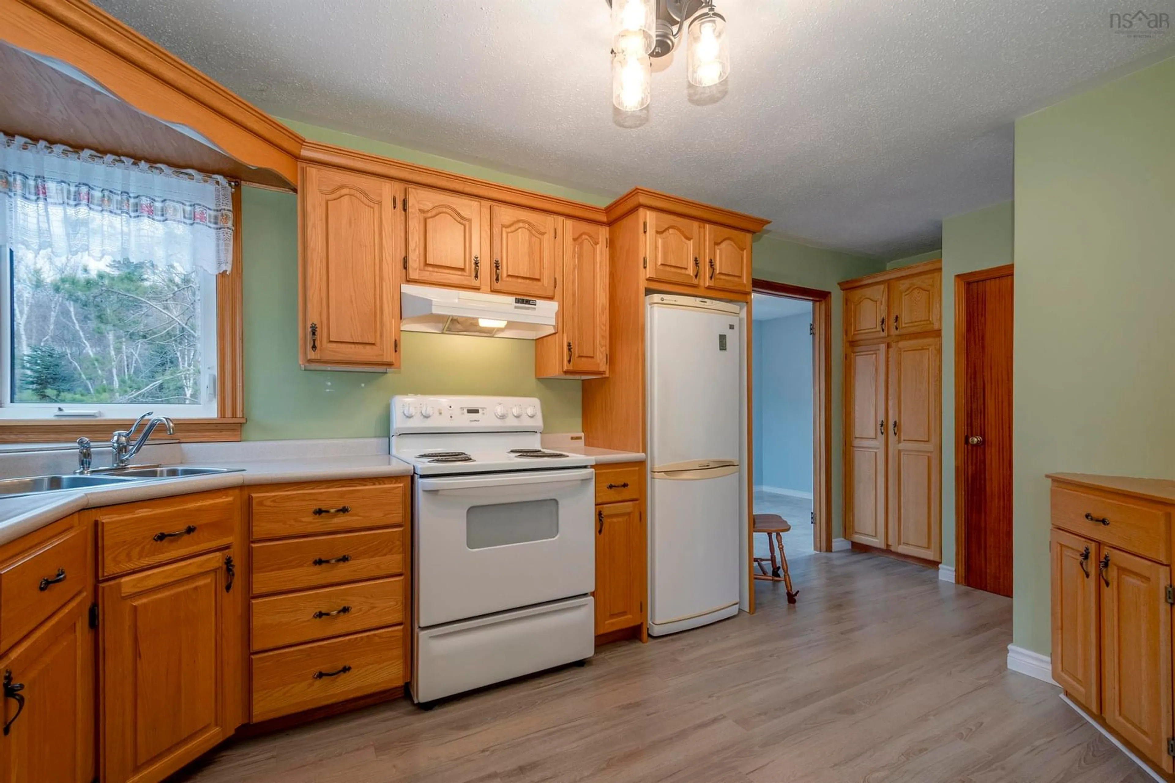 Standard kitchen, wood/laminate floor for 4231 Shore Rd, Parkers Cove Nova Scotia B0S 1A0