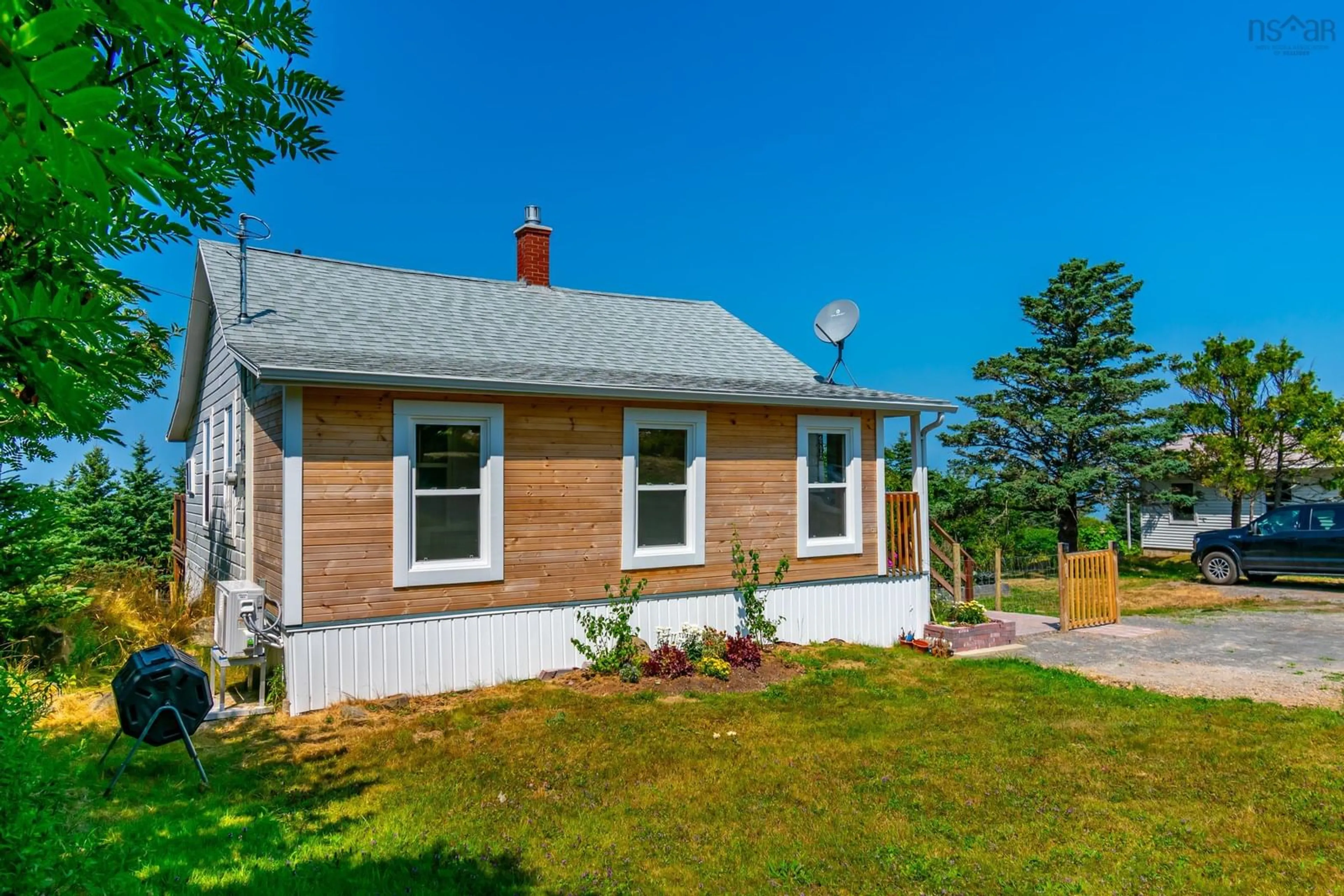 Home with vinyl exterior material, street for 2807 Highway 362, Margaretsville Nova Scotia B0S 1N0