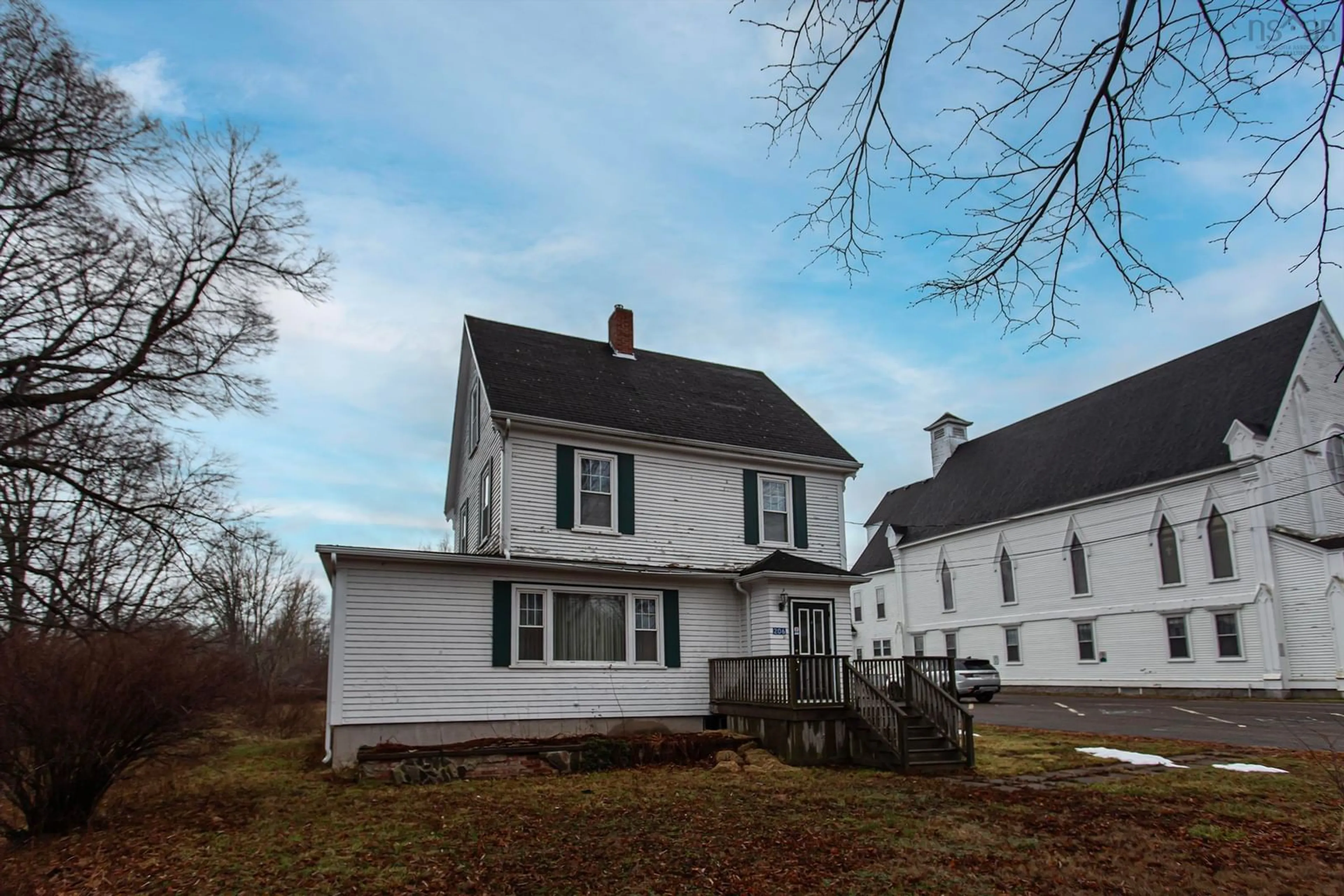 A pic from outside/outdoor area/front of a property/back of a property/a pic from drone, street for 206 Main St, Middleton Nova Scotia B0S 1P0