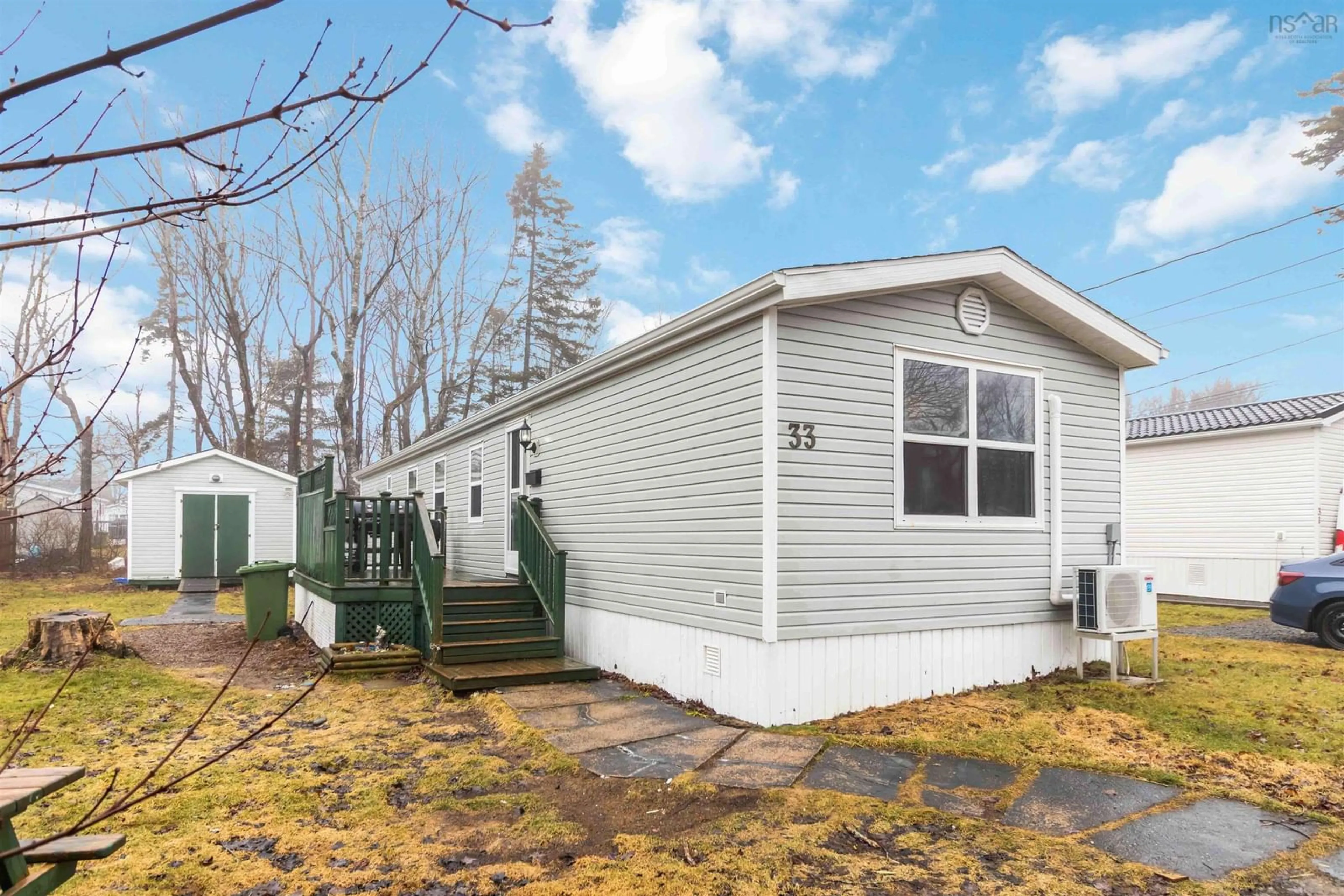 Home with vinyl exterior material, street for 33 Elcona Dr, Middle Sackville Nova Scotia B4E 3B1