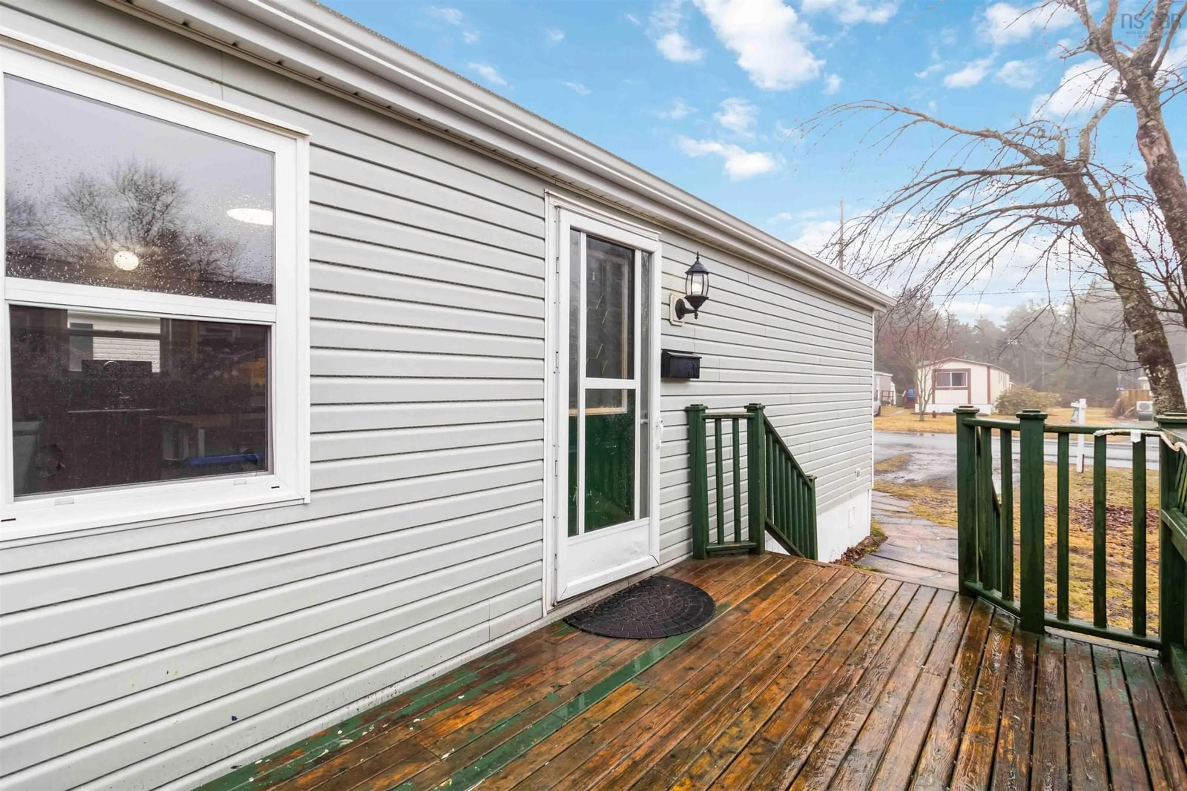 Home with vinyl exterior material, street for 33 Elcona Dr, Middle Sackville Nova Scotia B4E 3B1