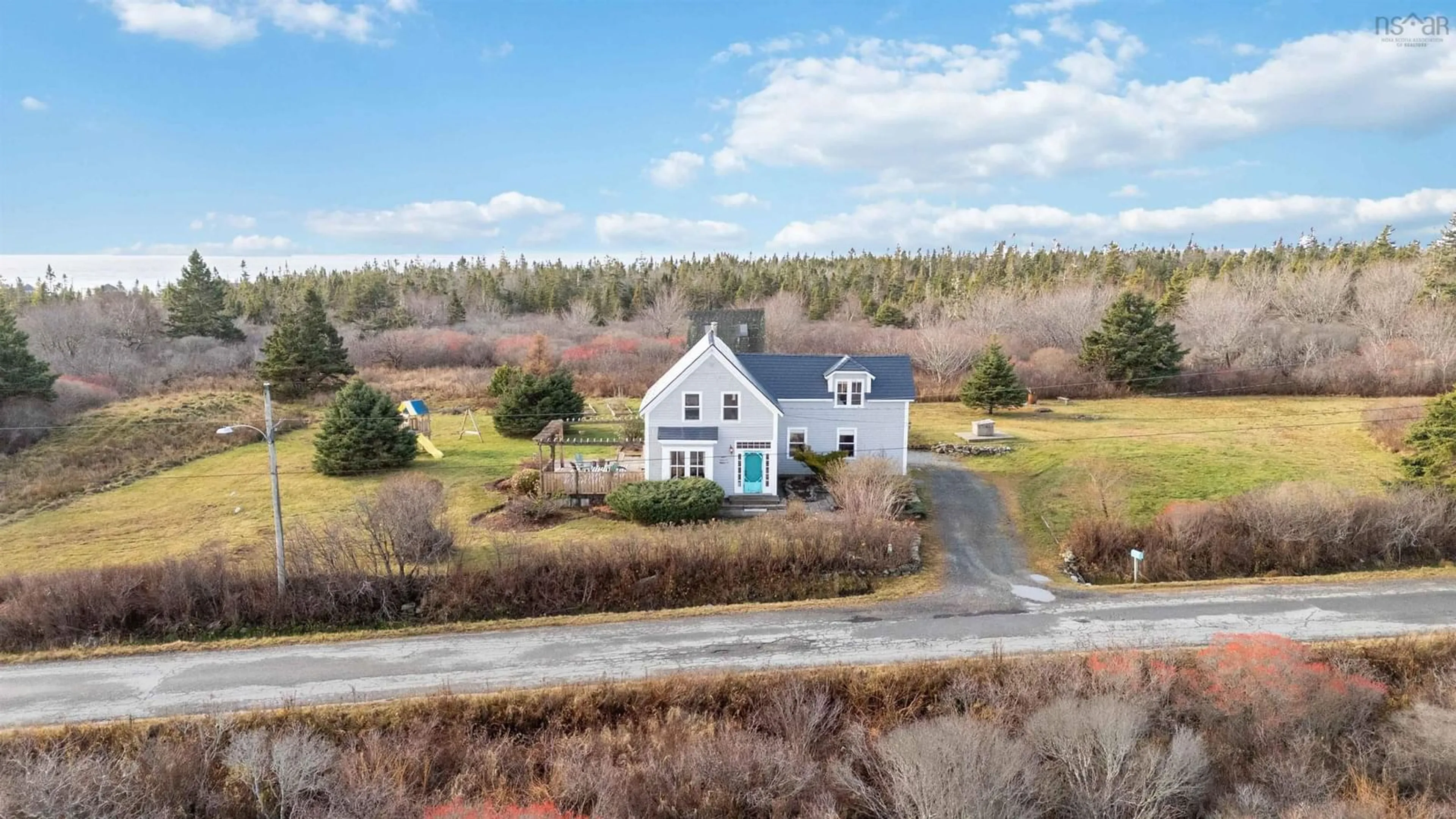 A pic from outside/outdoor area/front of a property/back of a property/a pic from drone, water/lake/river/ocean view for 34 Lighthouse Rd, Western Head Nova Scotia B0T 1K0