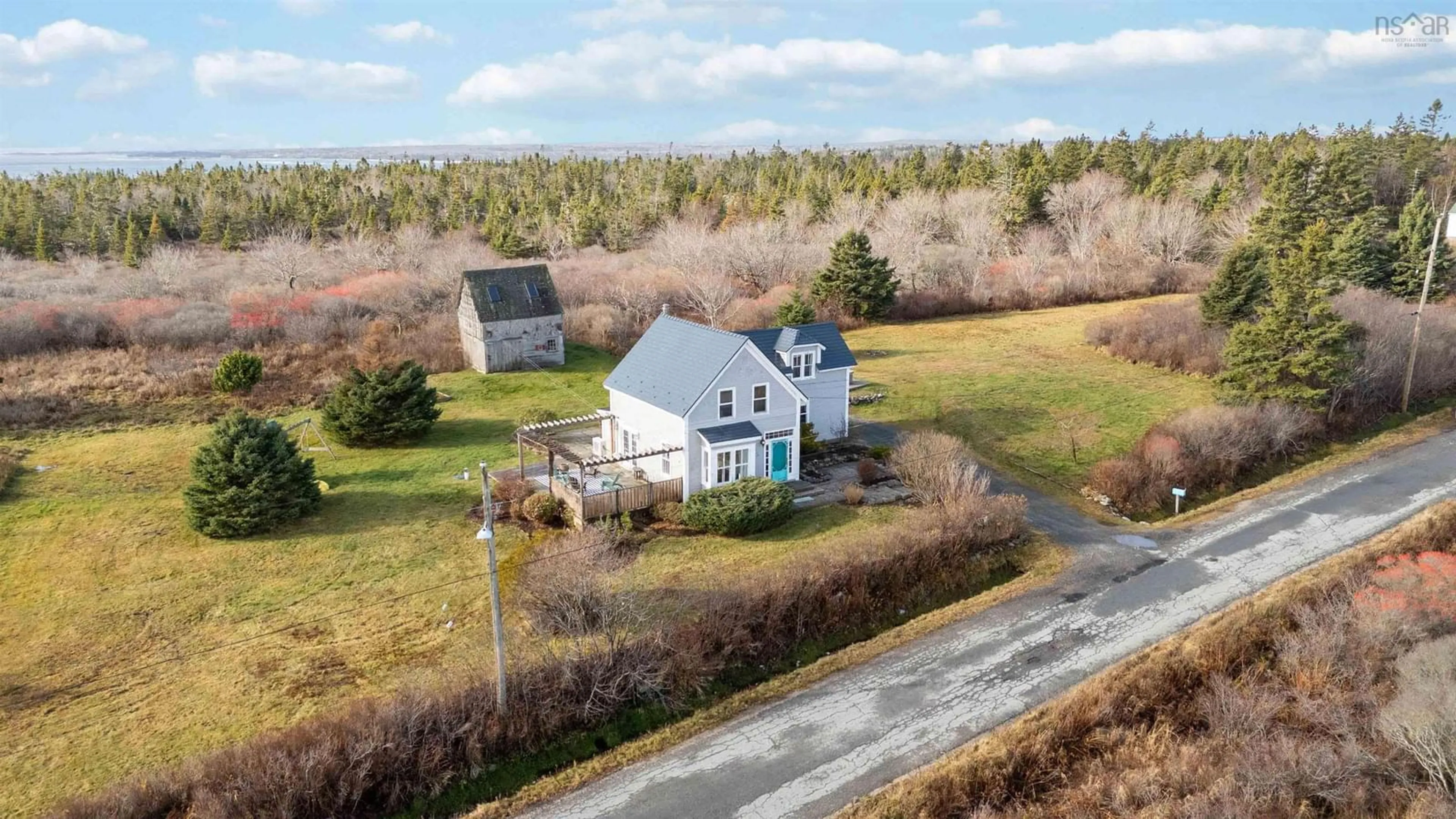 A pic from outside/outdoor area/front of a property/back of a property/a pic from drone, unknown for 34 Lighthouse Rd, Western Head Nova Scotia B0T 1K0