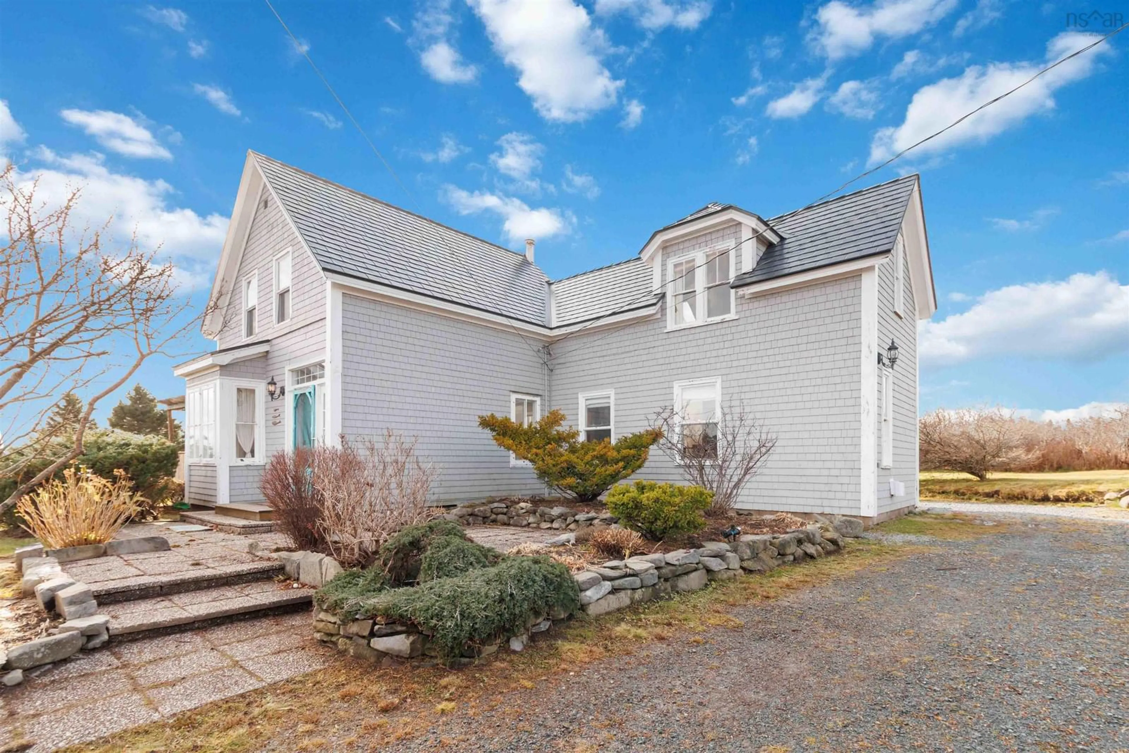 Home with vinyl exterior material, street for 34 Lighthouse Rd, Western Head Nova Scotia B0T 1K0