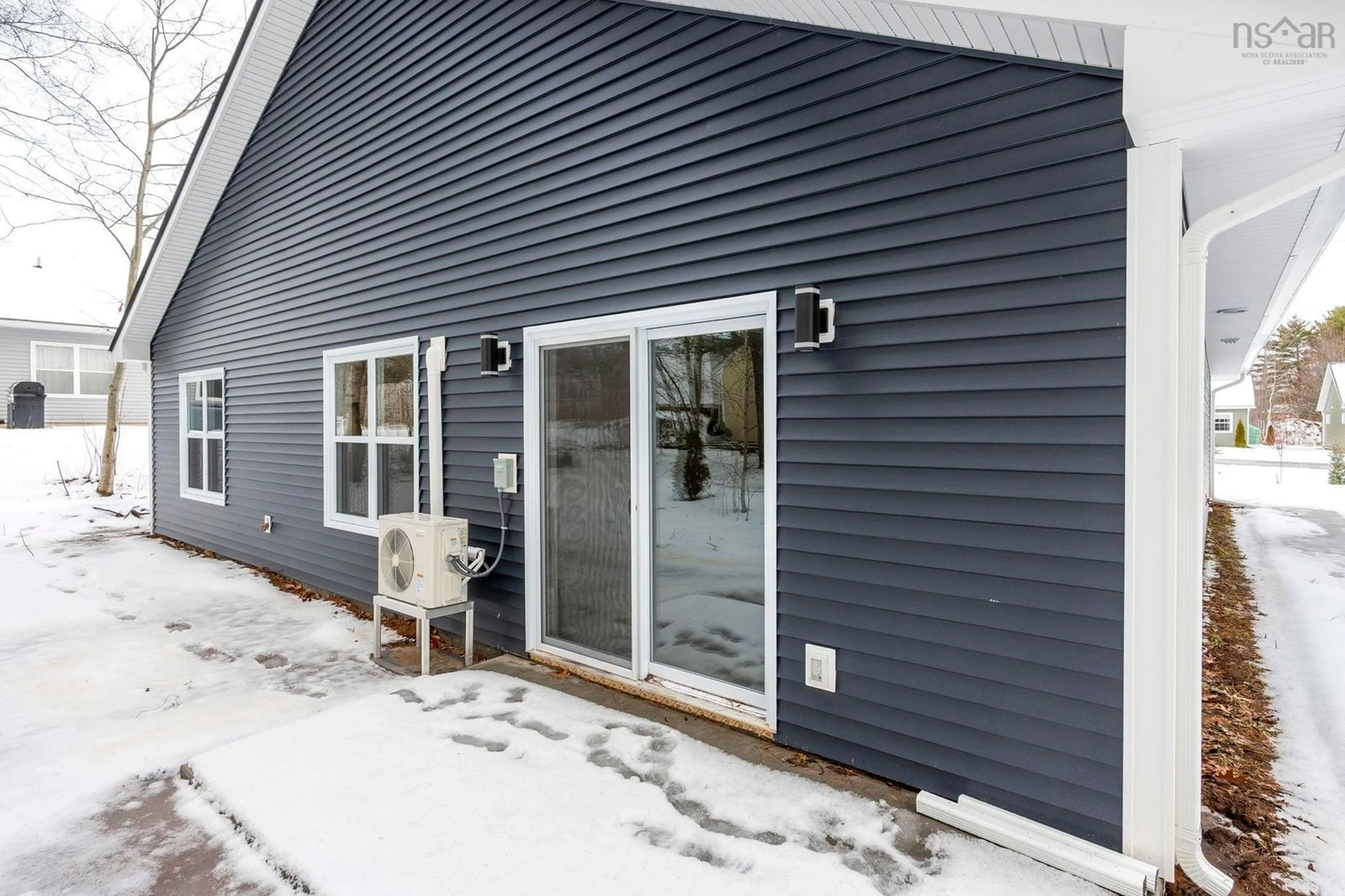 Home with vinyl exterior material, street for 10 Peterson St, Cambridge Nova Scotia B0P 1G0