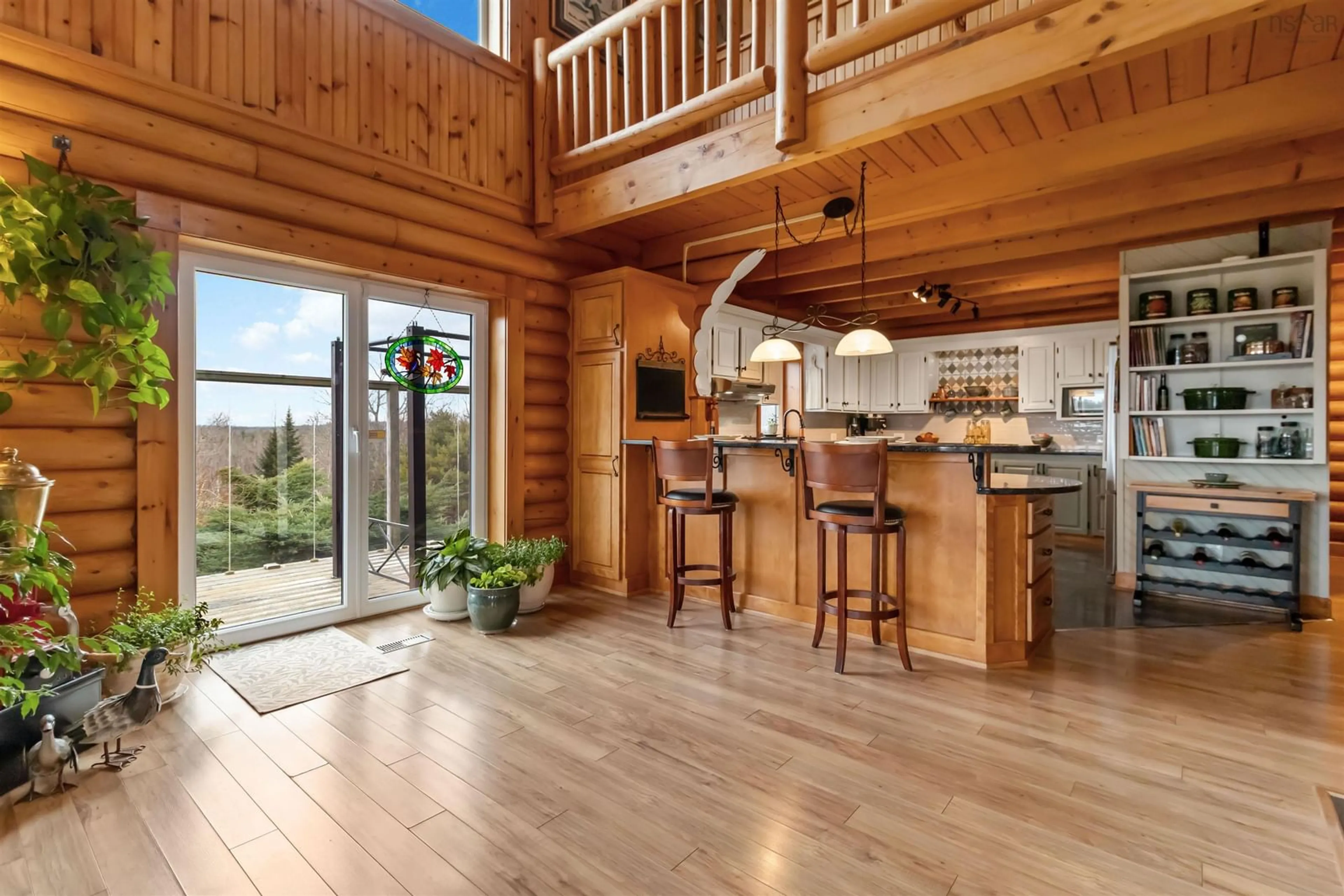 Open concept kitchen, wood/laminate floor for 4058 Highway 325, Newcombville Nova Scotia B4V 8M9