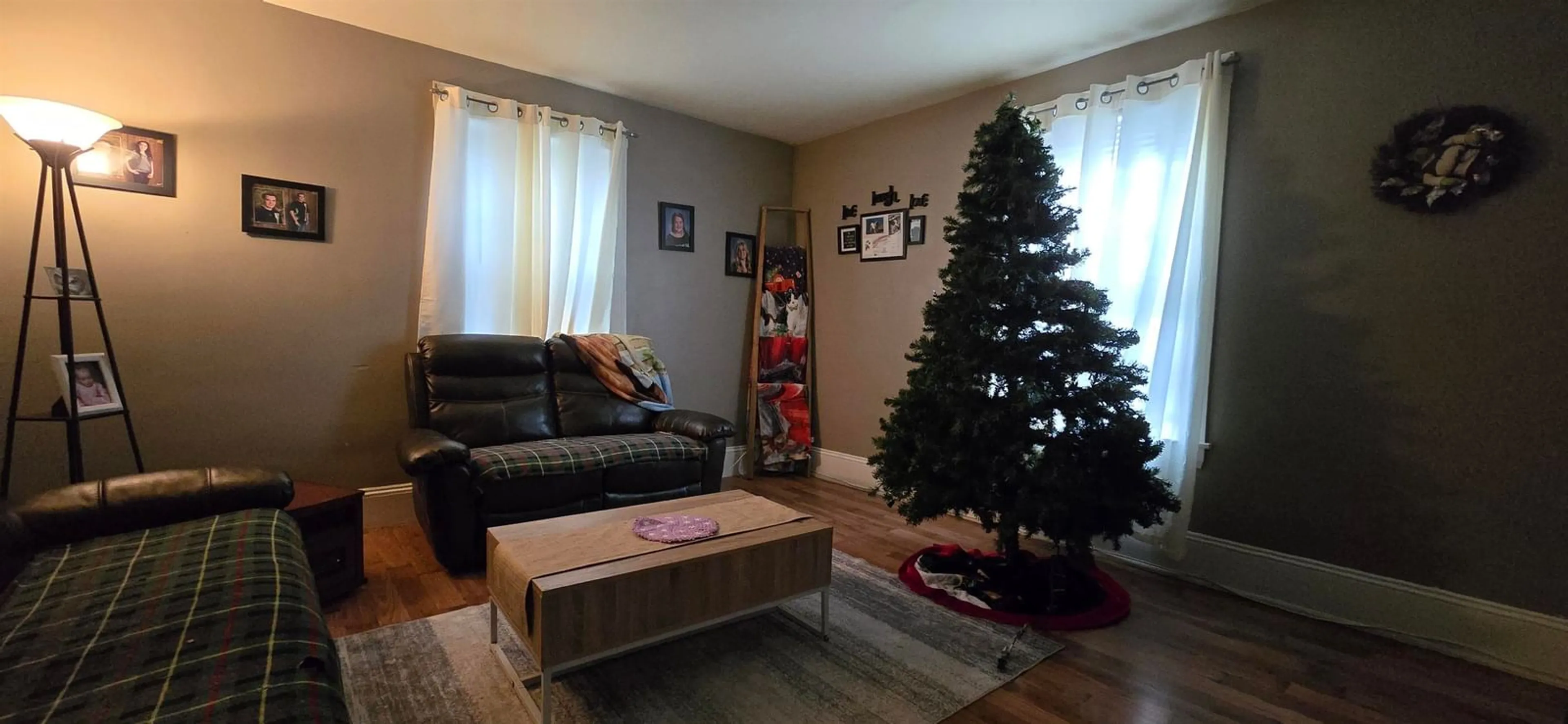 Living room with furniture, wood/laminate floor for 1618 King St, Windsor Nova Scotia B0N 2T0