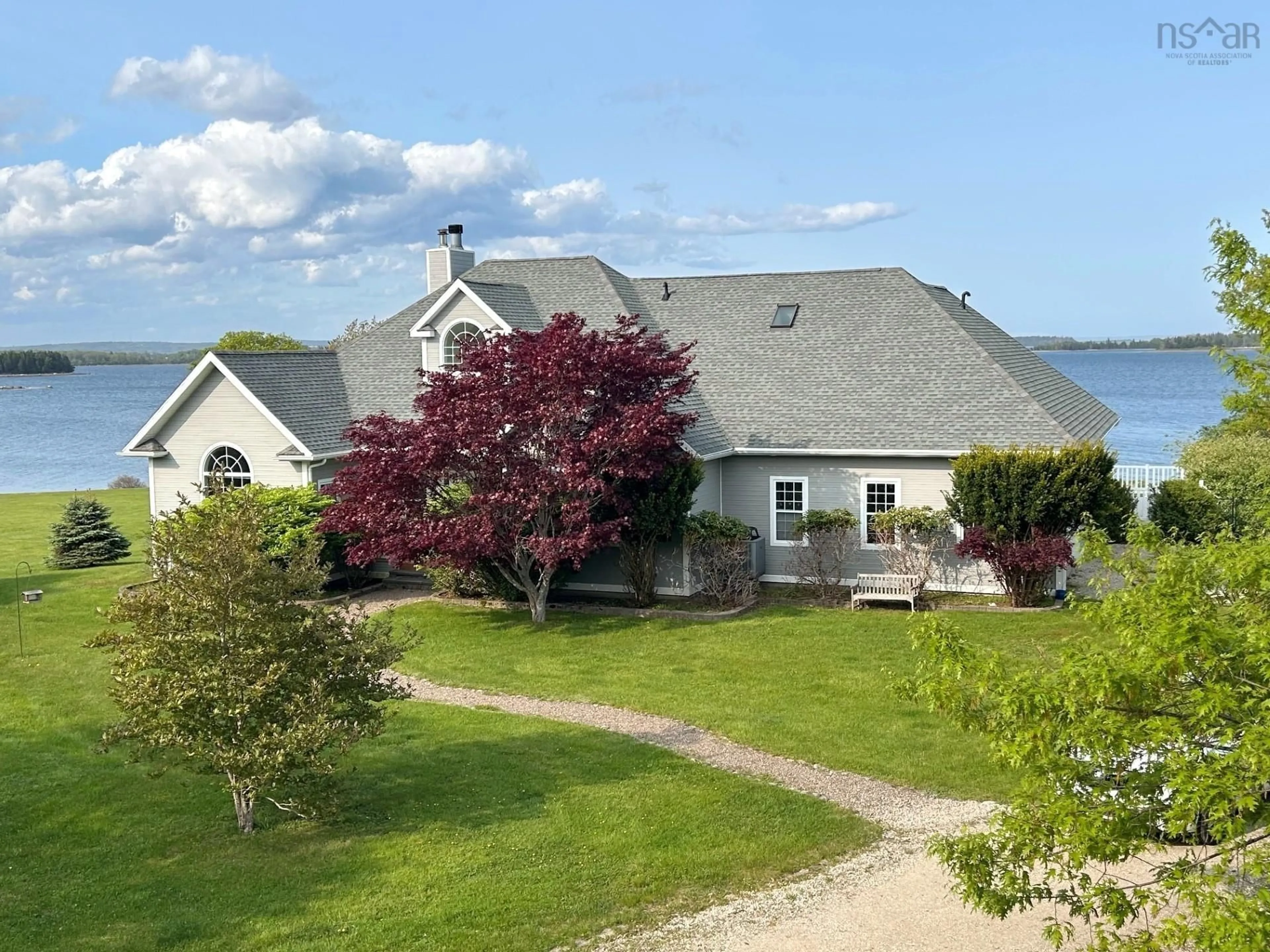A pic from outside/outdoor area/front of a property/back of a property/a pic from drone, water/lake/river/ocean view for 35 Sea Oaks Lane, Martins Point Nova Scotia B0J 1E0