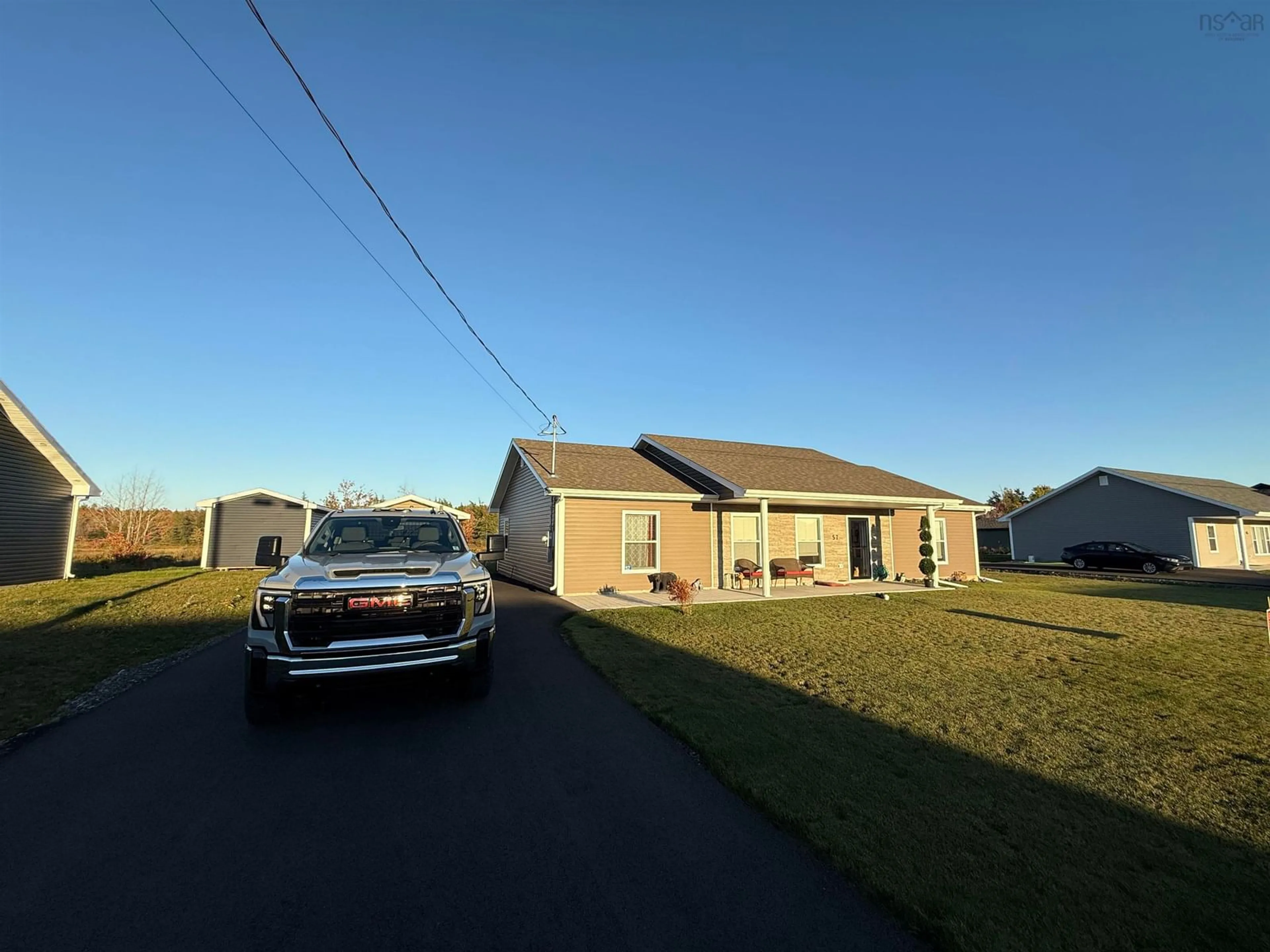 A pic from outside/outdoor area/front of a property/back of a property/a pic from drone, street for 57 Michael St, Sydney Nova Scotia B1P 0J6