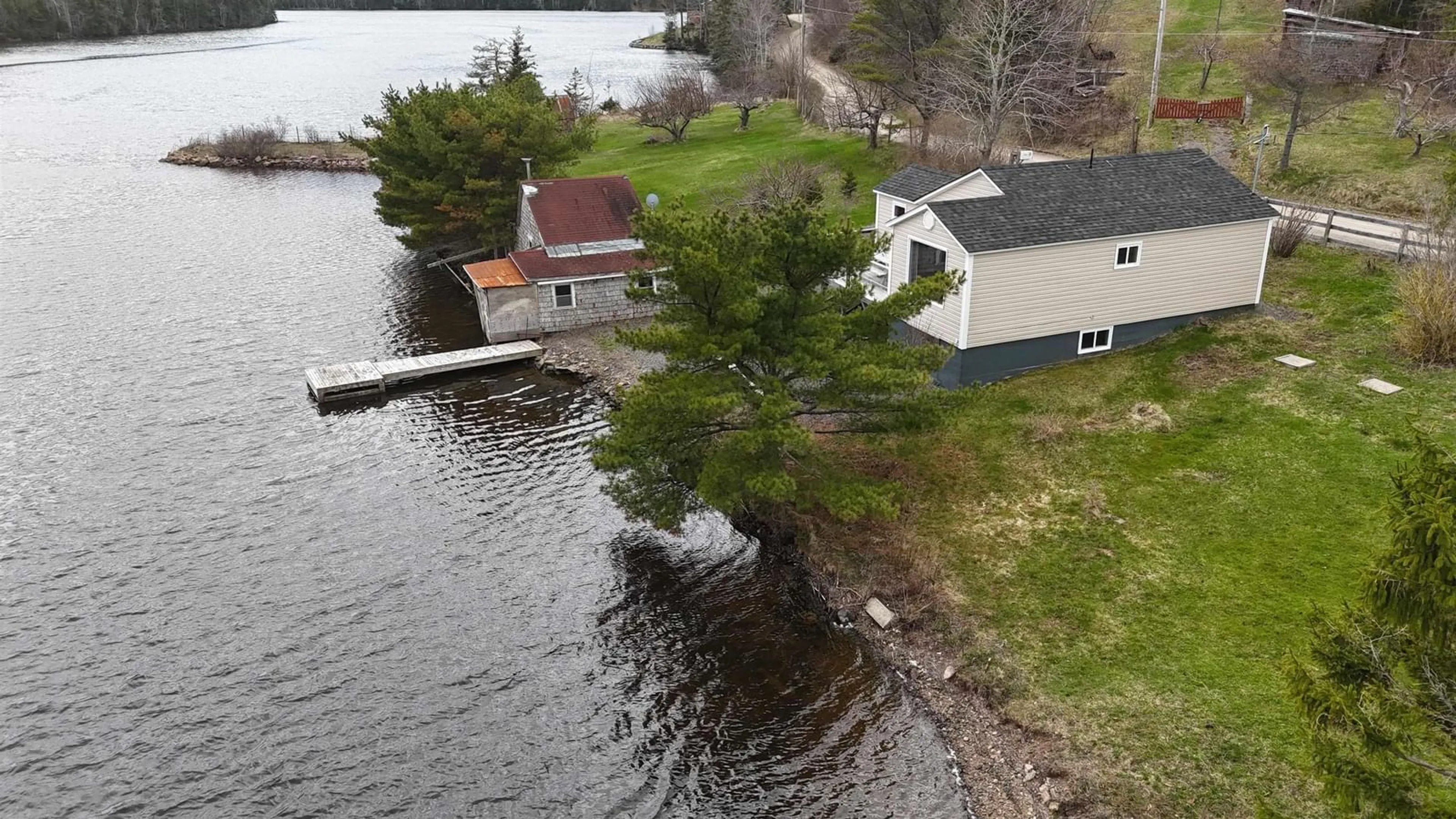 A pic from outside/outdoor area/front of a property/back of a property/a pic from drone, water/lake/river/ocean view for 118 Old Black River Rd, Dundee Nova Scotia B0E 3K0