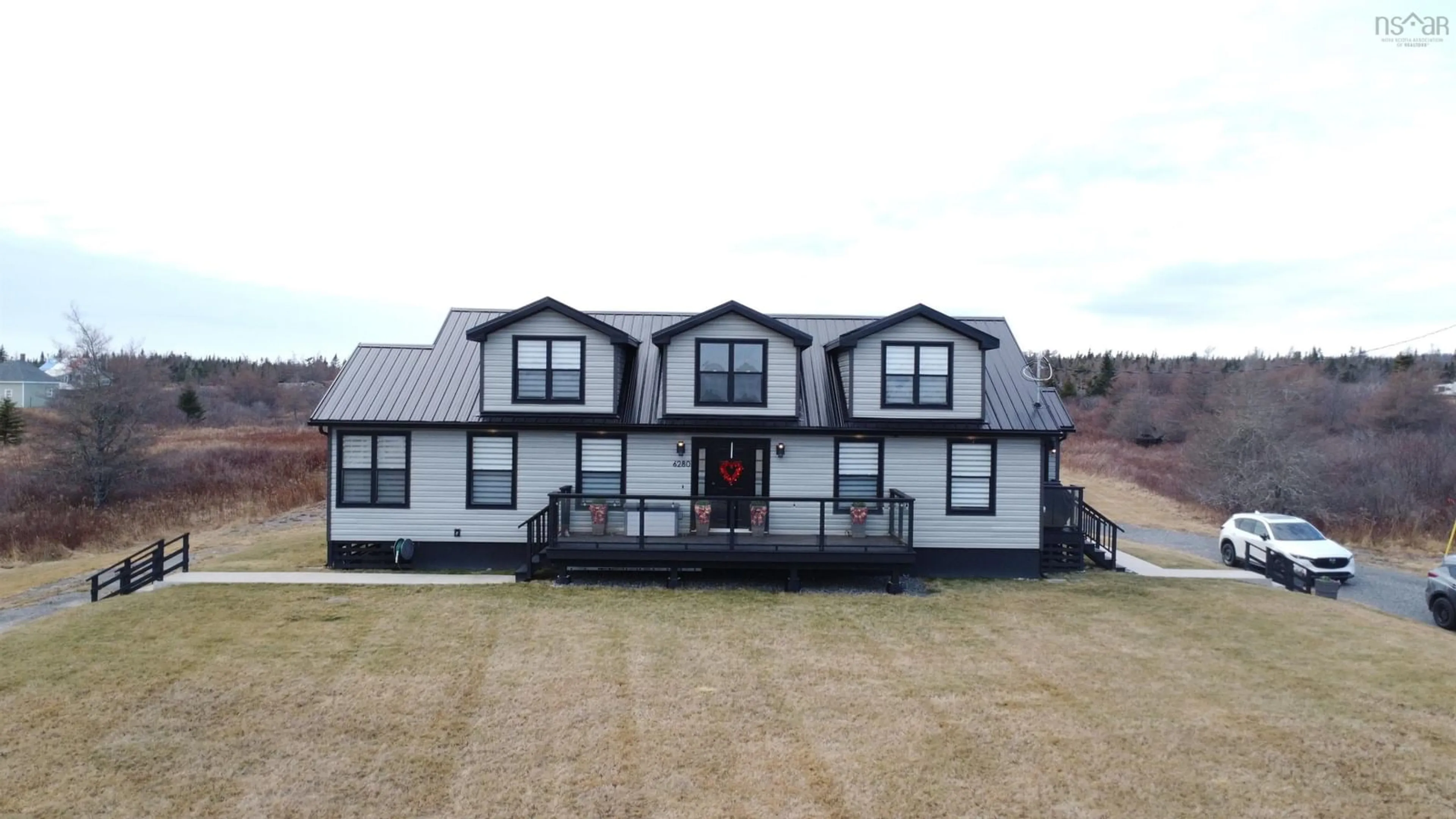 A pic from outside/outdoor area/front of a property/back of a property/a pic from drone, building for 6280 Highway 316, Larry's River Nova Scotia B0H 1T0